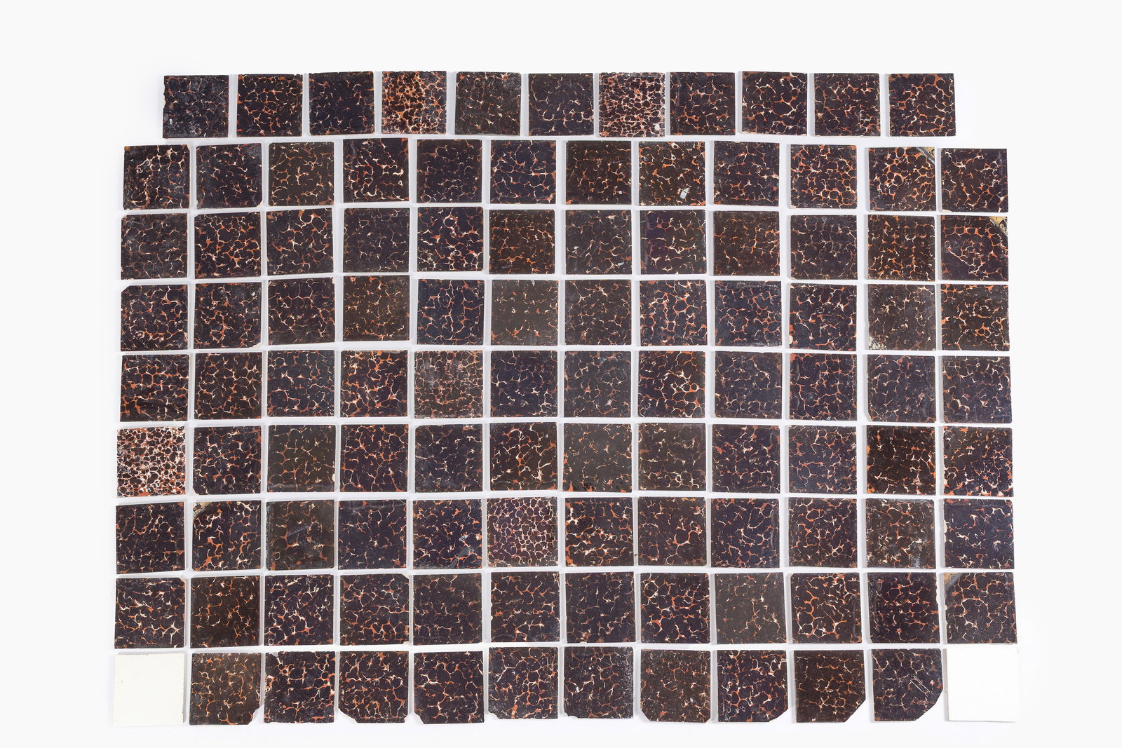 105 Dutch Delft 'tortoise' tiles, 18th C. (1 of 2)