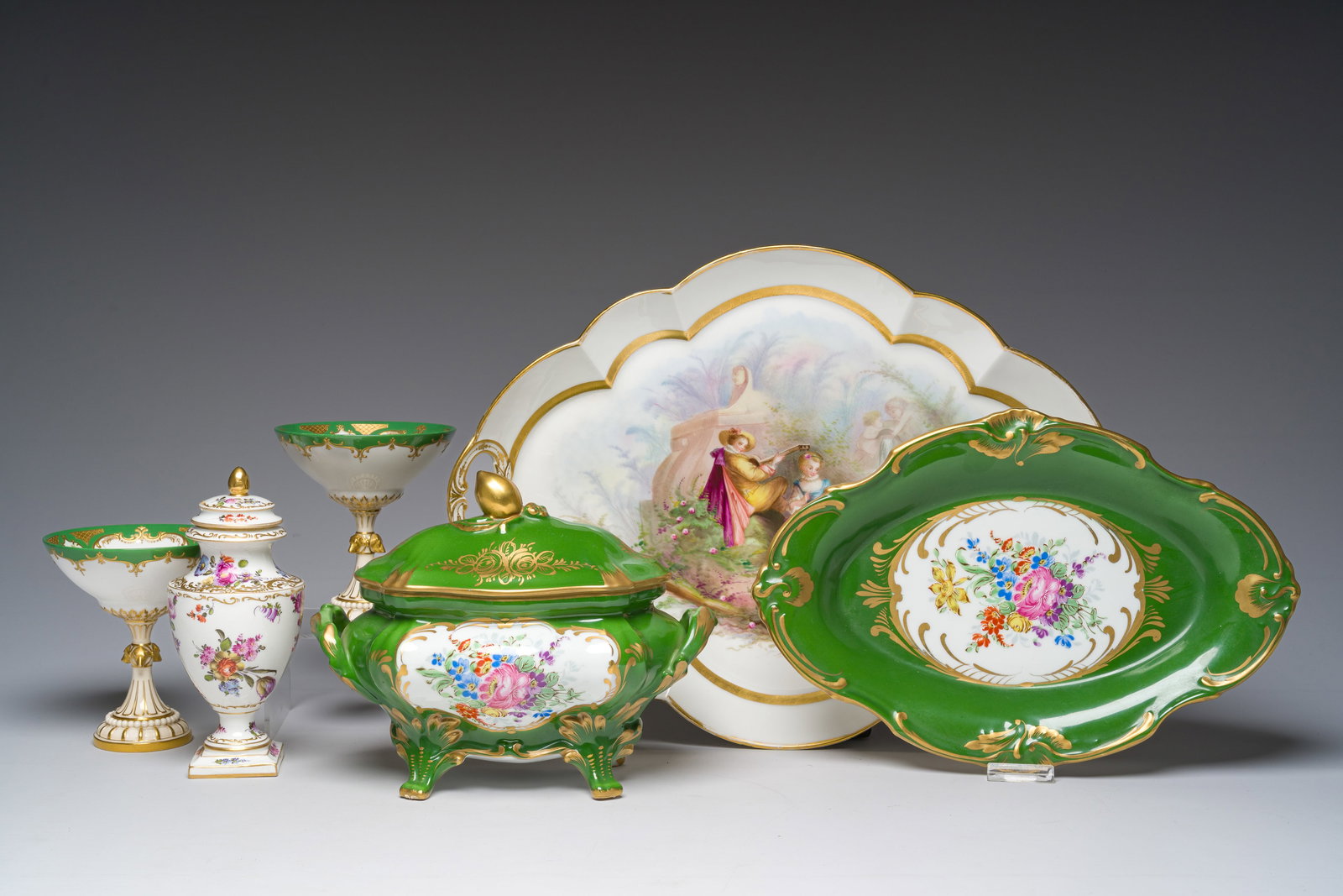 A varied collection of European polychrome and gilt decorated porcelain, a.o. a dish signed Alice (1 of 12)