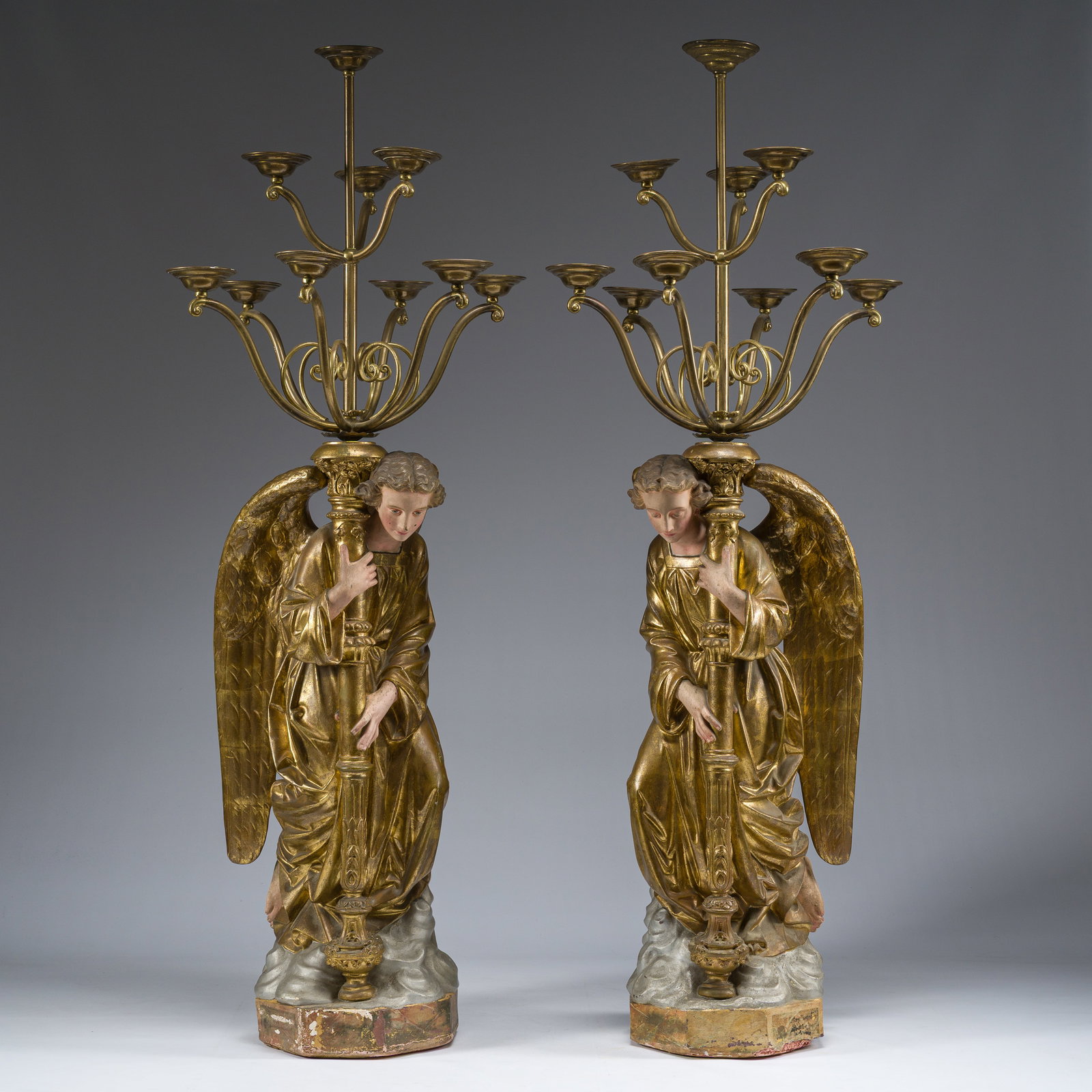 An impressive pair of polychrome decorated plaster angels mounted into ten-light candlesticks, 20th (1 of 16)
