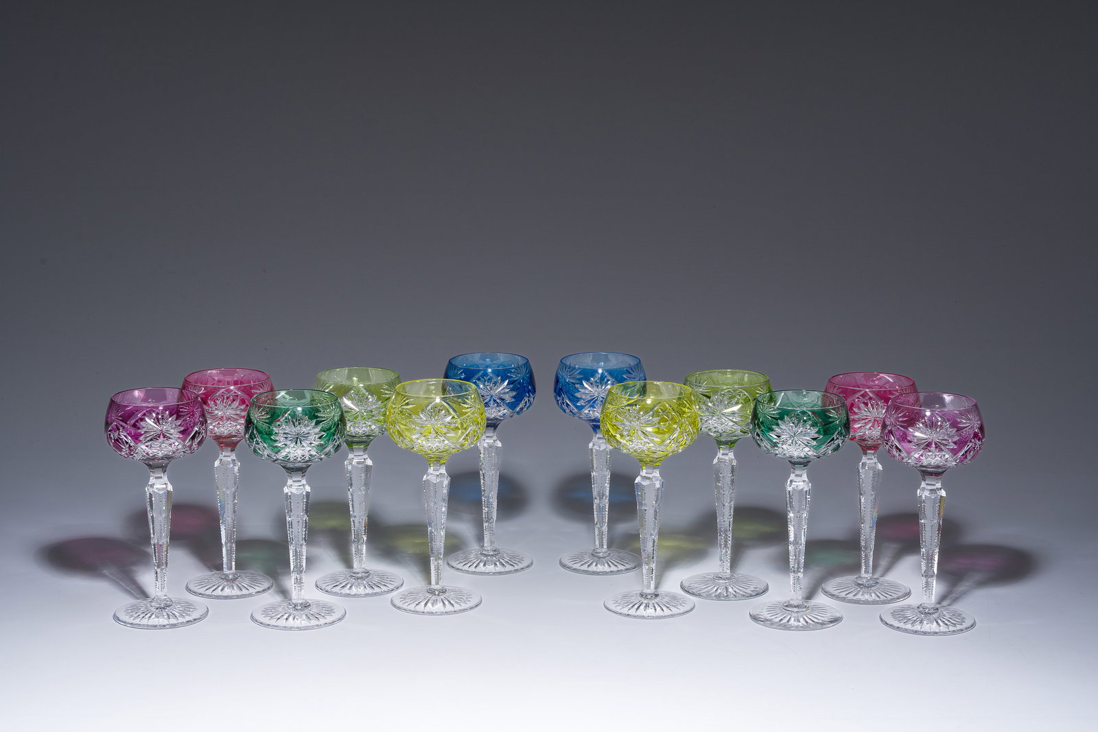 Twelve partly coloured overlay crystal cut glasses, model 'Munster', Val Saint Lambert, 20th C. (1 of 8)