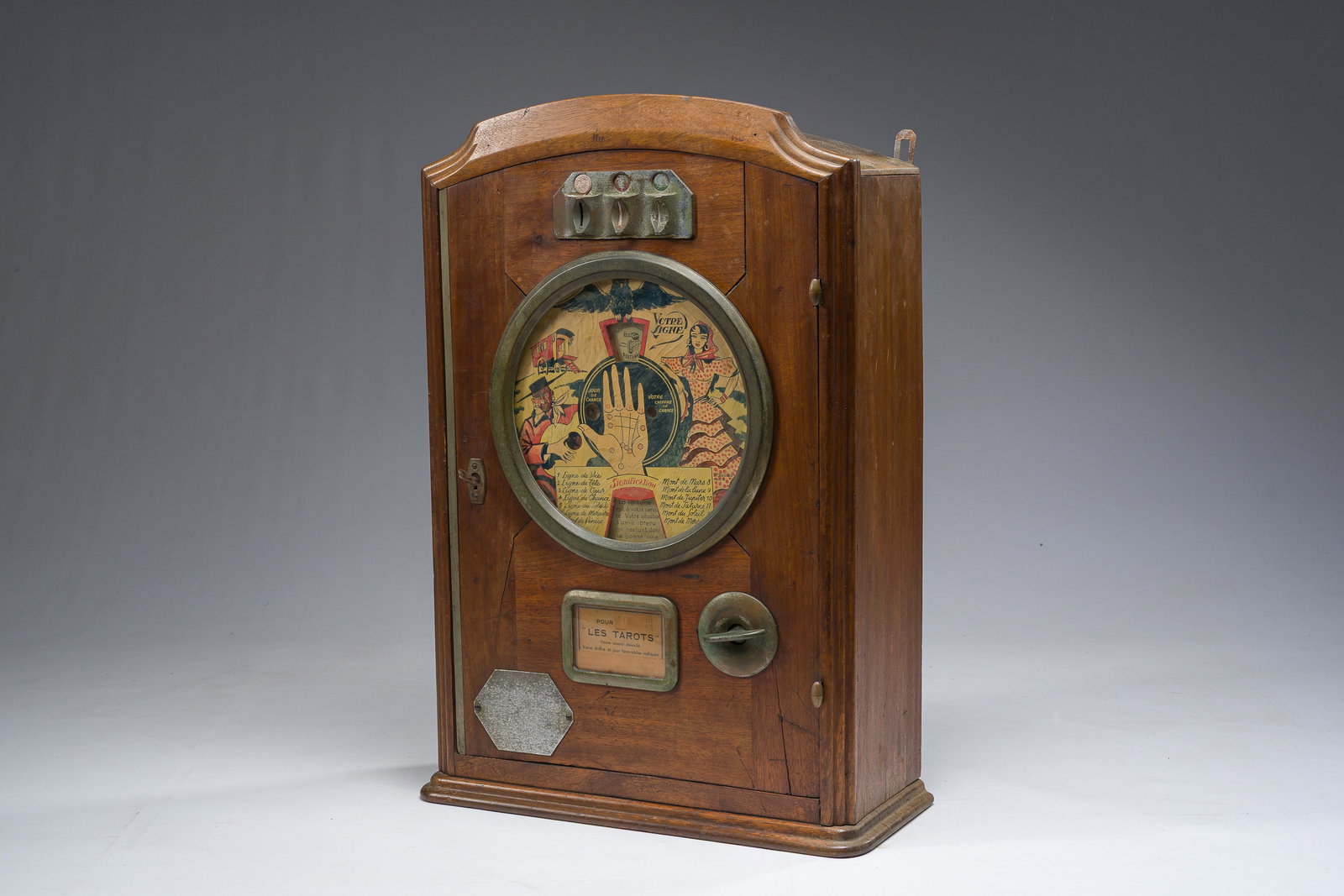 A French wooden coin-operated 'Votre Ligne' fortune-telling machine, 'La Gitane-Gypsy', Bussoz, (1 of 10)