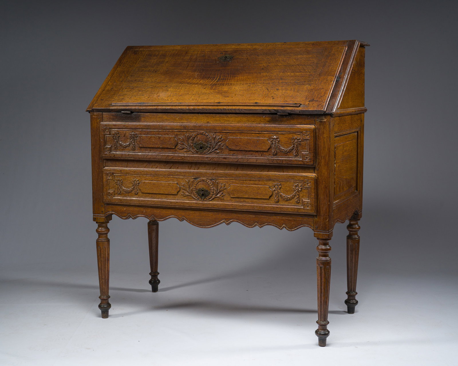 A French oak Louis XVI fall front desk with two drawers, 18th/19th C. (1 of 7)