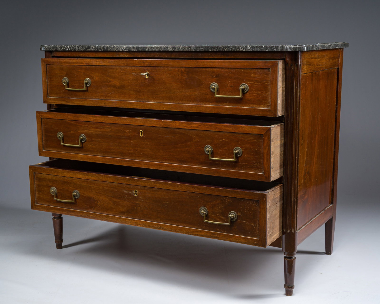 A French Louis XVI style bronze mounted wooden chest of drawers with veined grey marble top, late (1 of 8)