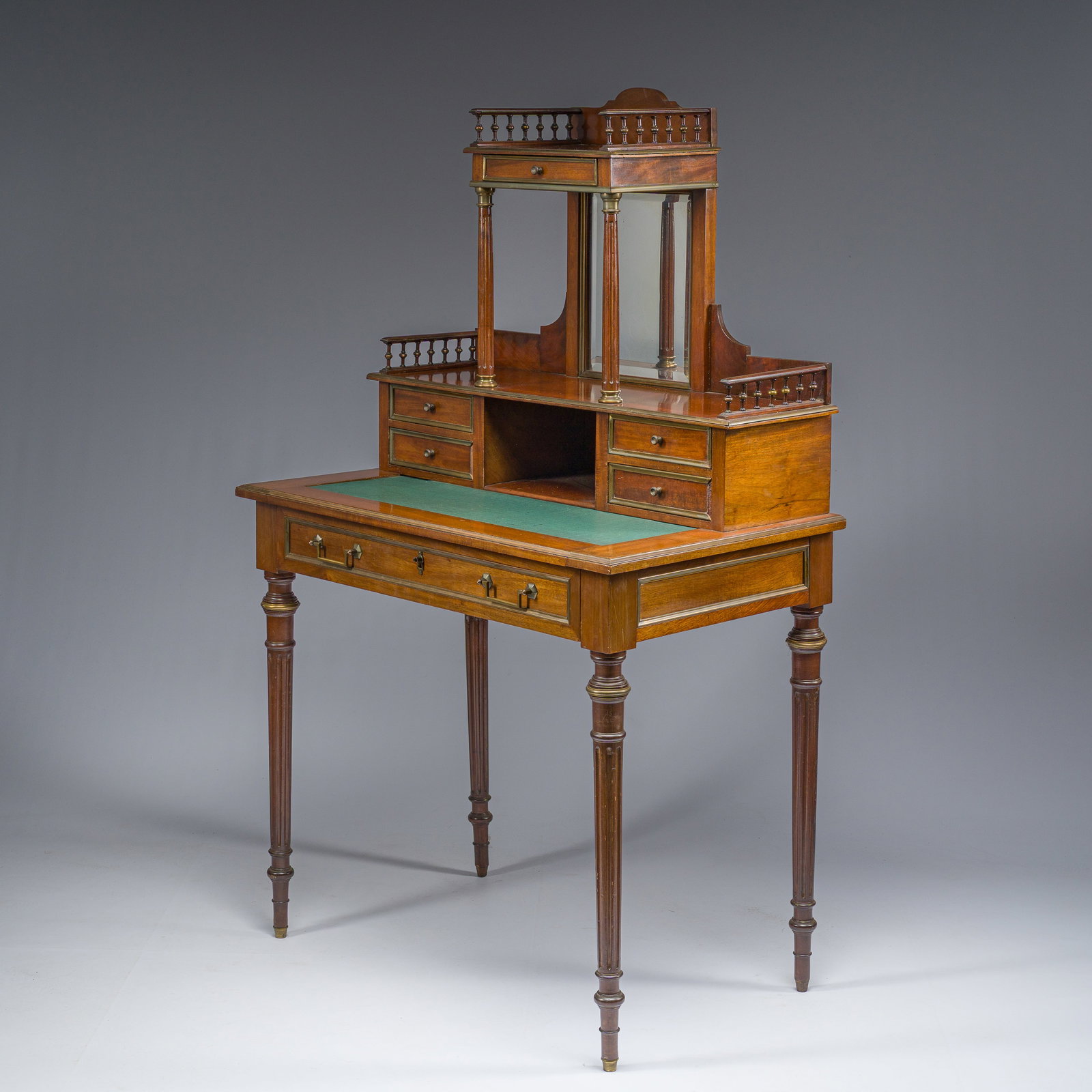 A French Directoire style bronze mounted partially gilt wooden ladies' desk-coiffeuse, marked (1 of 7)