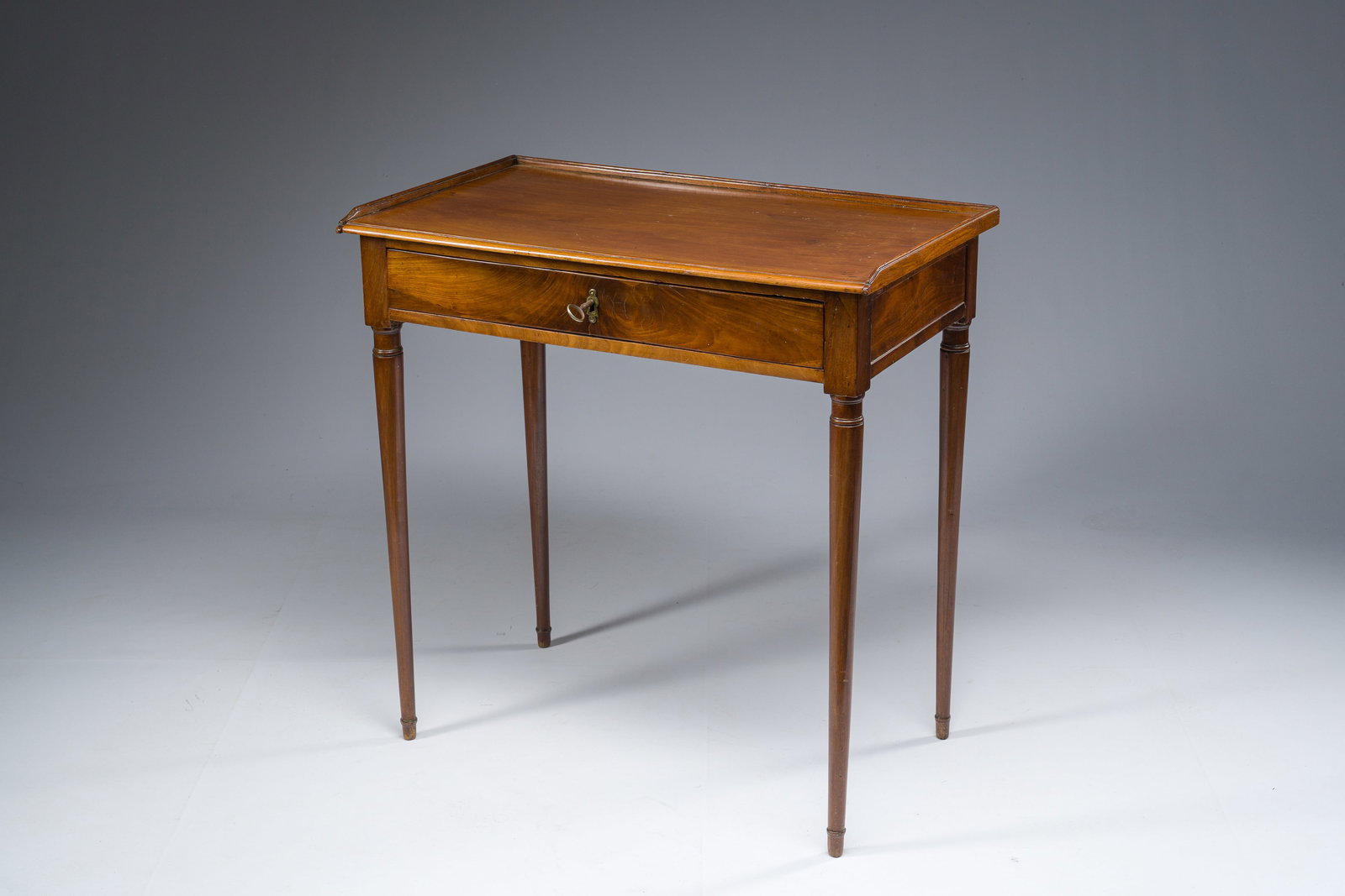 A French Louis XVI bronze mounted mahogany writing table with a drawer, early 19th C. (1 of 7)
