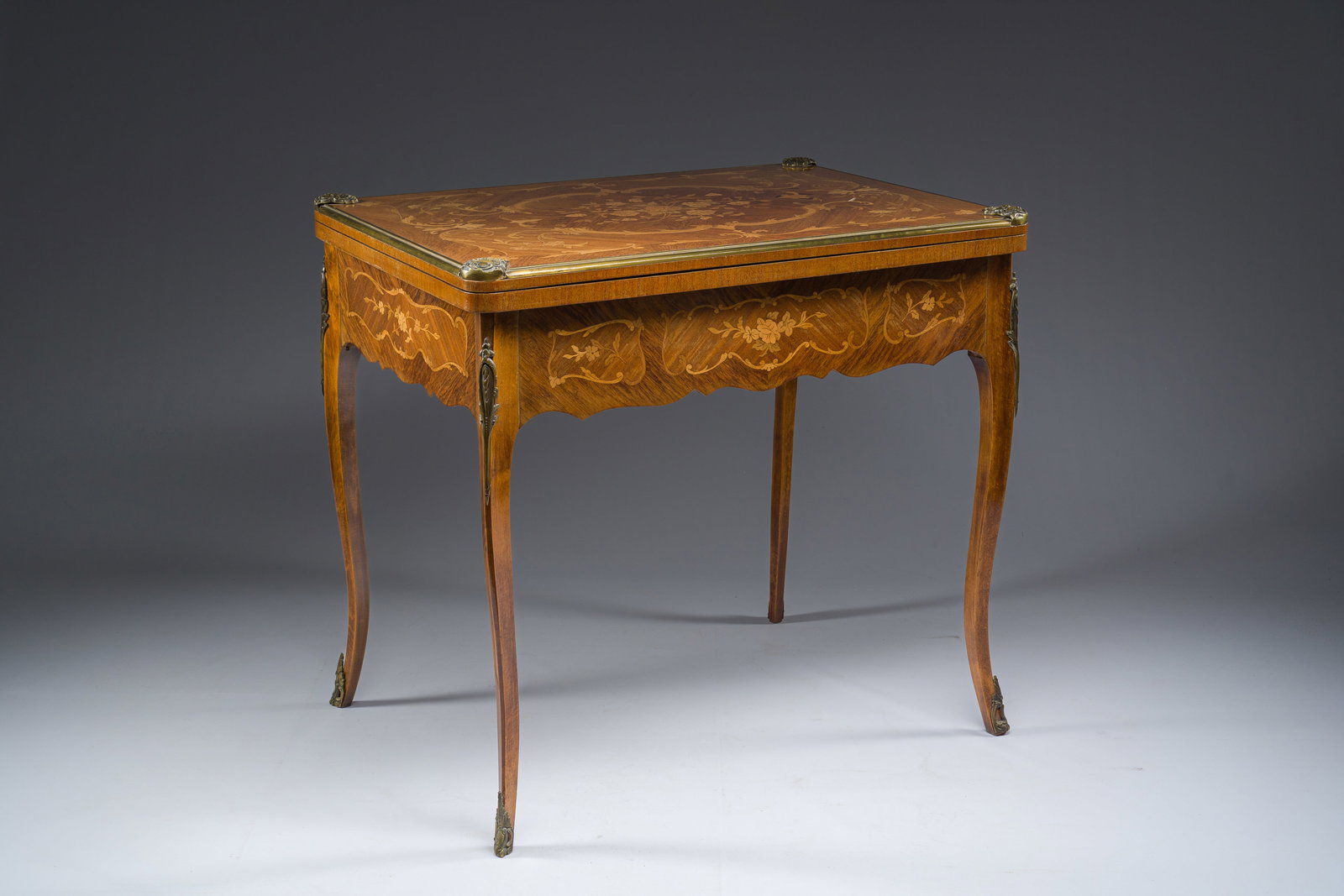 A French Louis XV style gilt bronze mounted wooden marquetry card or backgammon table, first half (1 of 14)