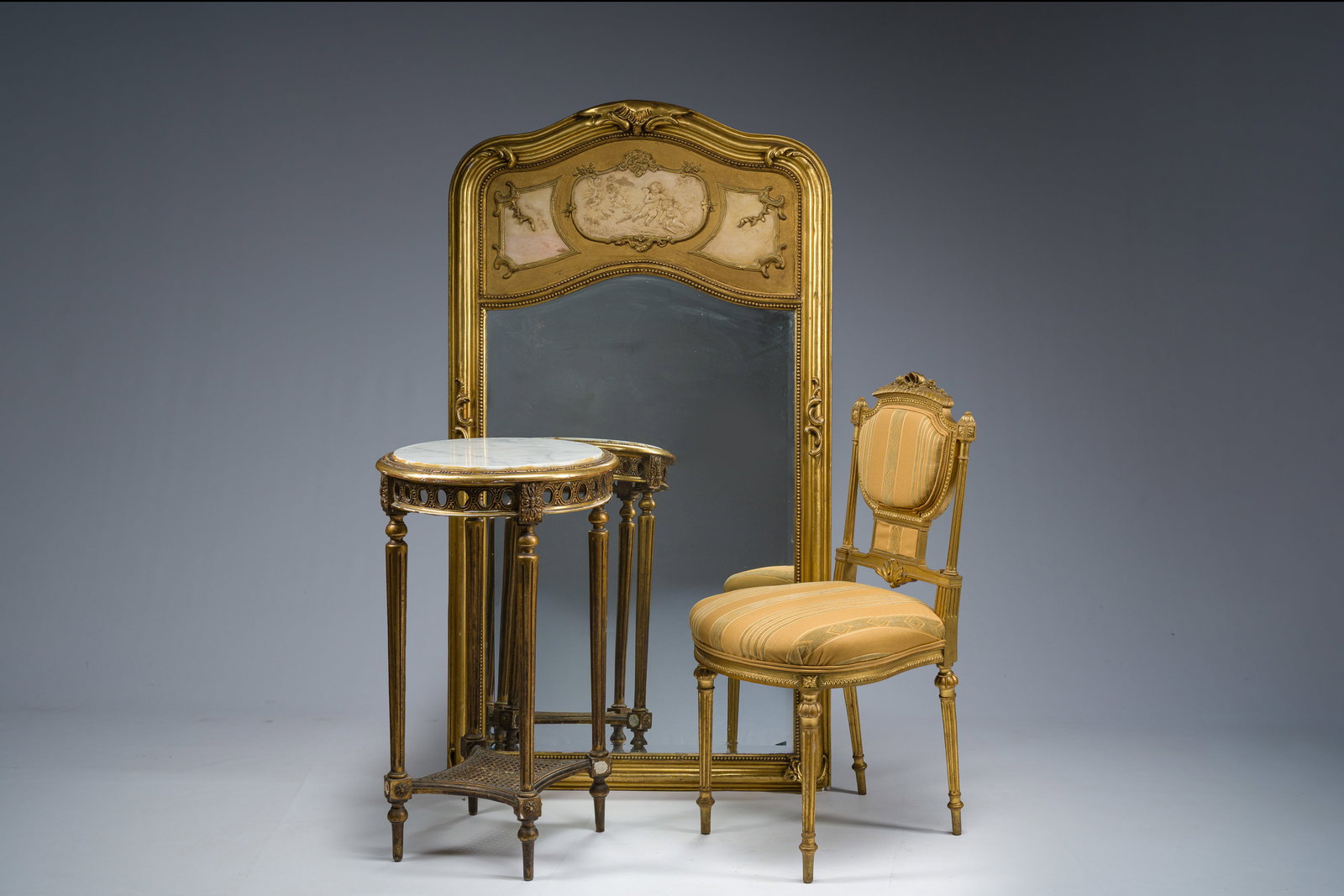 A French side table with marble top, a mirror with plaster details, and a gilt wooden chair, (1 of 8)