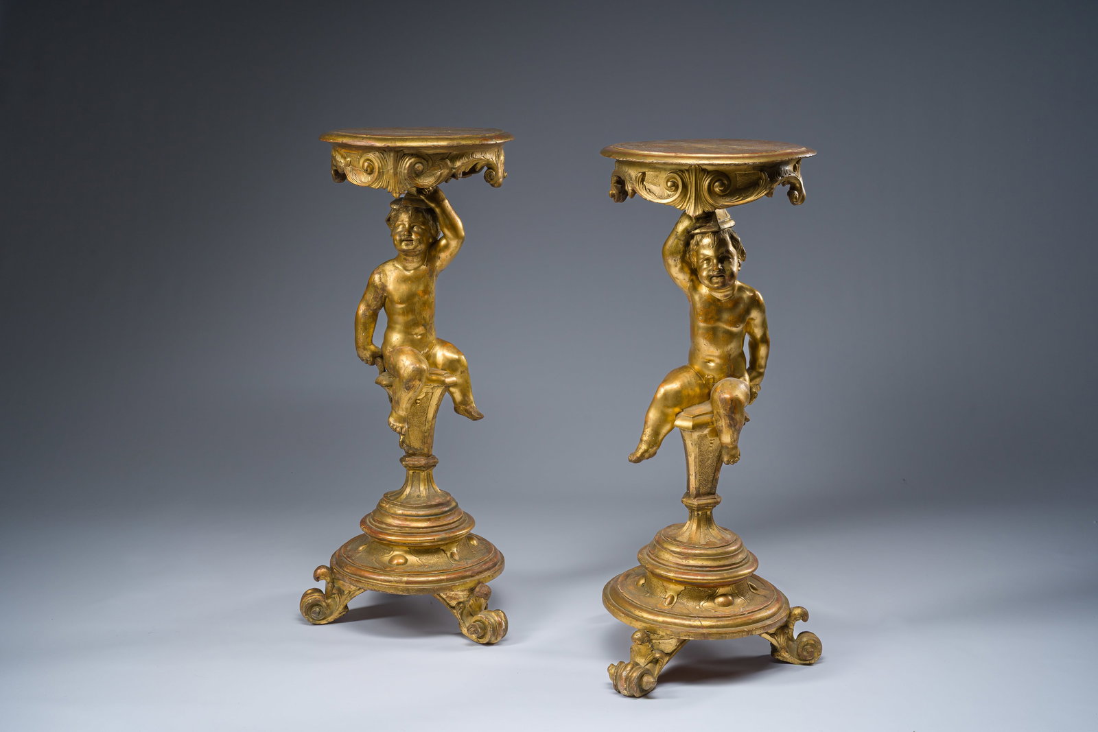 A pair of Italian carved and gilt wooden tripod side tables with putti, ca. 1800 (1 of 10)