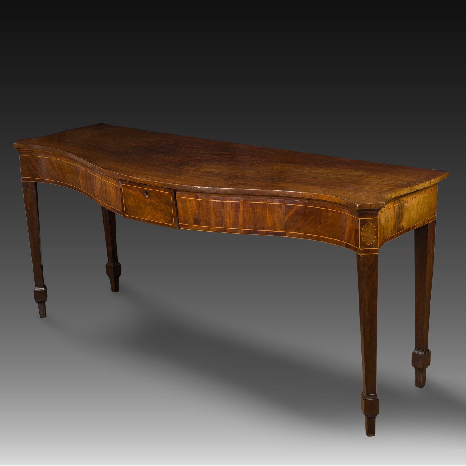 An English George III mahogany veneered one-drawer serving or side table, 19th C. (1 of 8)