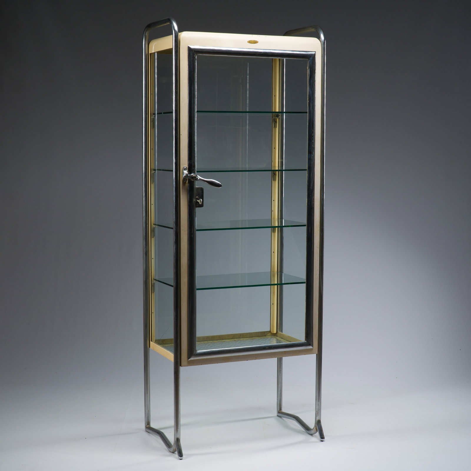 A Belgian chrome-plated and patinated metal doctor's display case with four glass shelves, Usines (1 of 9)