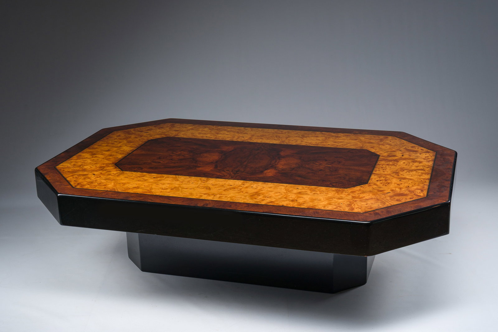 An octagonal Art Deco style burl veneered and lacquered wooden coffee table, 1970s (1 of 9)