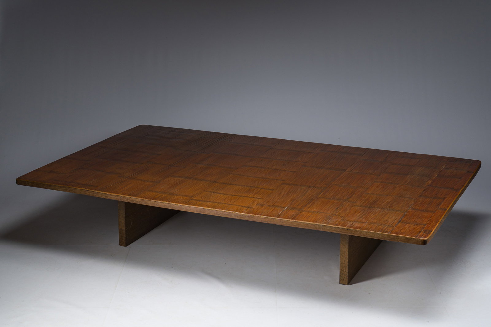 A Chinese bamboo and hardwooden opium table, 20th C.: A Chinese bamboo and hardwooden opium table, 20th C. H 32,5 - L 168 - D 101,5 cm Provenance: - Ex-collection Axel Vervoordt, there acquired by the current owners in 1988.