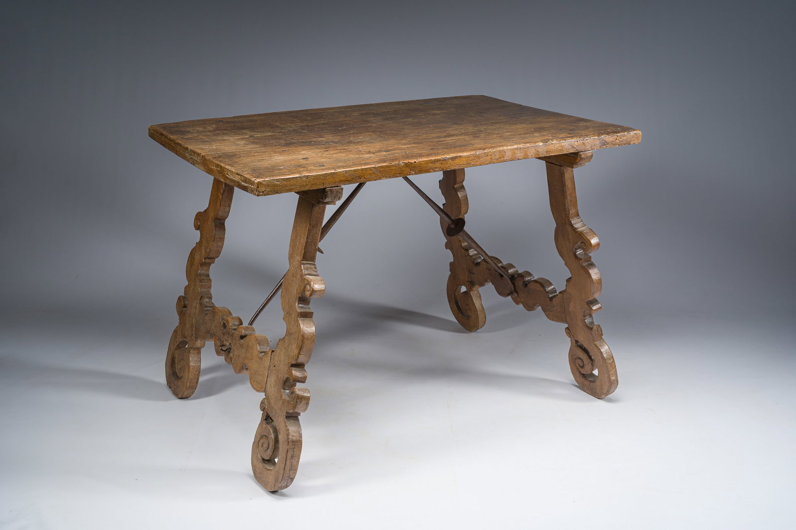 A Spanish walnut table with wrought iron connections, 18th C. (1 of 6)