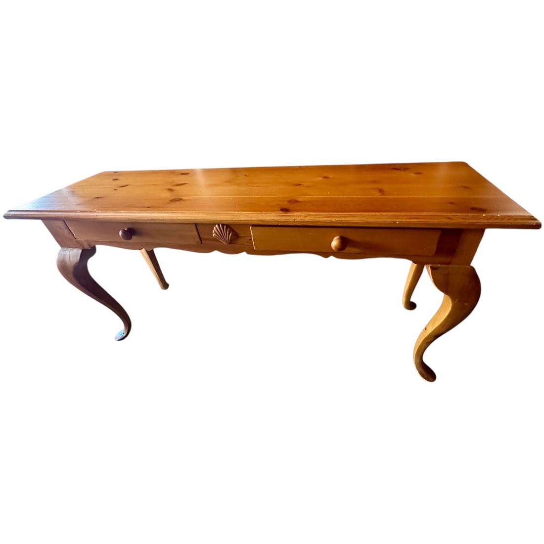 Vintage Pine Drawer Console: A charming vintage pine console table featuring Queen Anne–inspired cabriole legs and a simple rectangular top. The piece includes two drawers with wooden knobs and a central carved shell motif, off