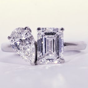 platinum tear drop and rectangular diamond ring