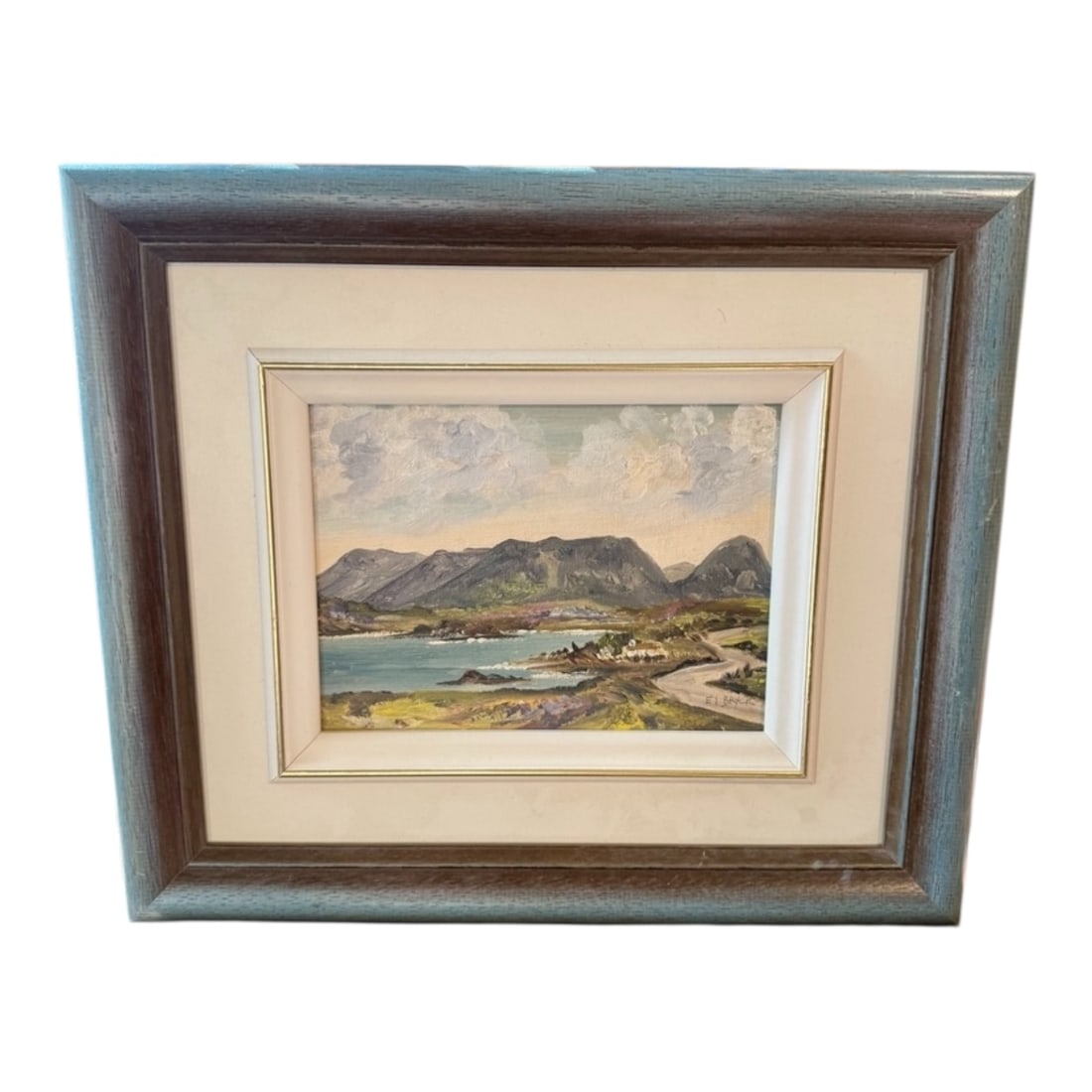 Mountain and Shoreline Landscape Oil Painting by E. I. Bryce: A serene landscape oil painting by E. I. Bryce featuring a coastal inlet with distant mountain forms and soft cloud movement across the sky. The artist’s impressionistic technique captures light and