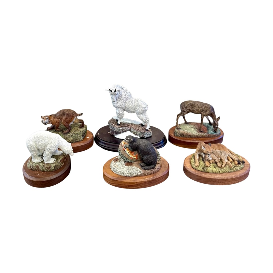 Hamilton Collection American Wildlife Bronze Figurines (5)- Deaton: Lot includes Mountain goat(white goat), otter, bobcat, Doe, Mountin LIon (cougar) These are finely detailed collector'scabinet edition sculptures, producedcin a bronze finish (cols-cast/plated). Each