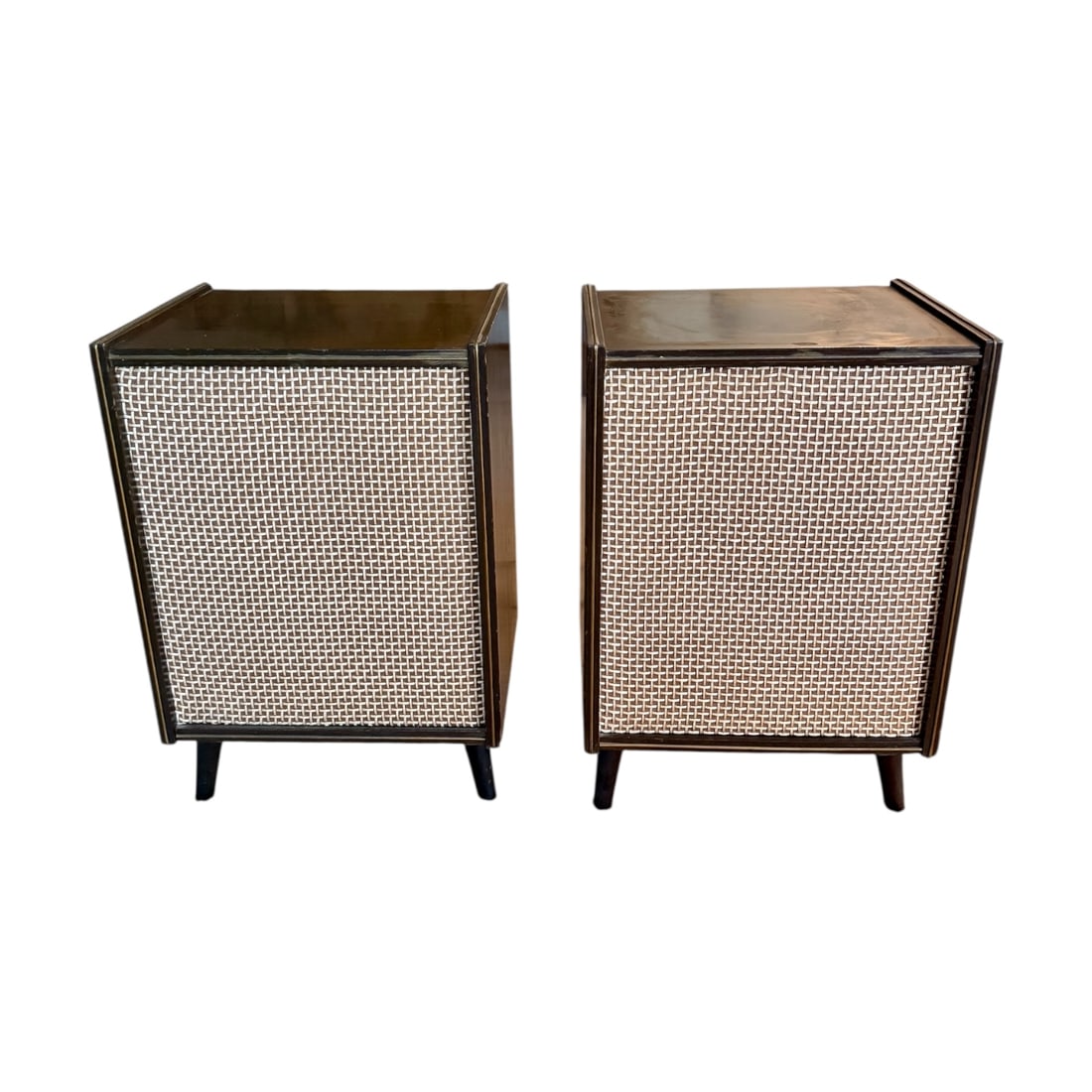 Pair of Vintage Sears Silvertone Mid-Century Stereo Speakers: Classic pair of vintage Sears Silvertone stereo speakers featuring mid-century wood cabinets with woven fabric grille fronts and tapered legs. Their clean rectangular form and warm walnut tone make