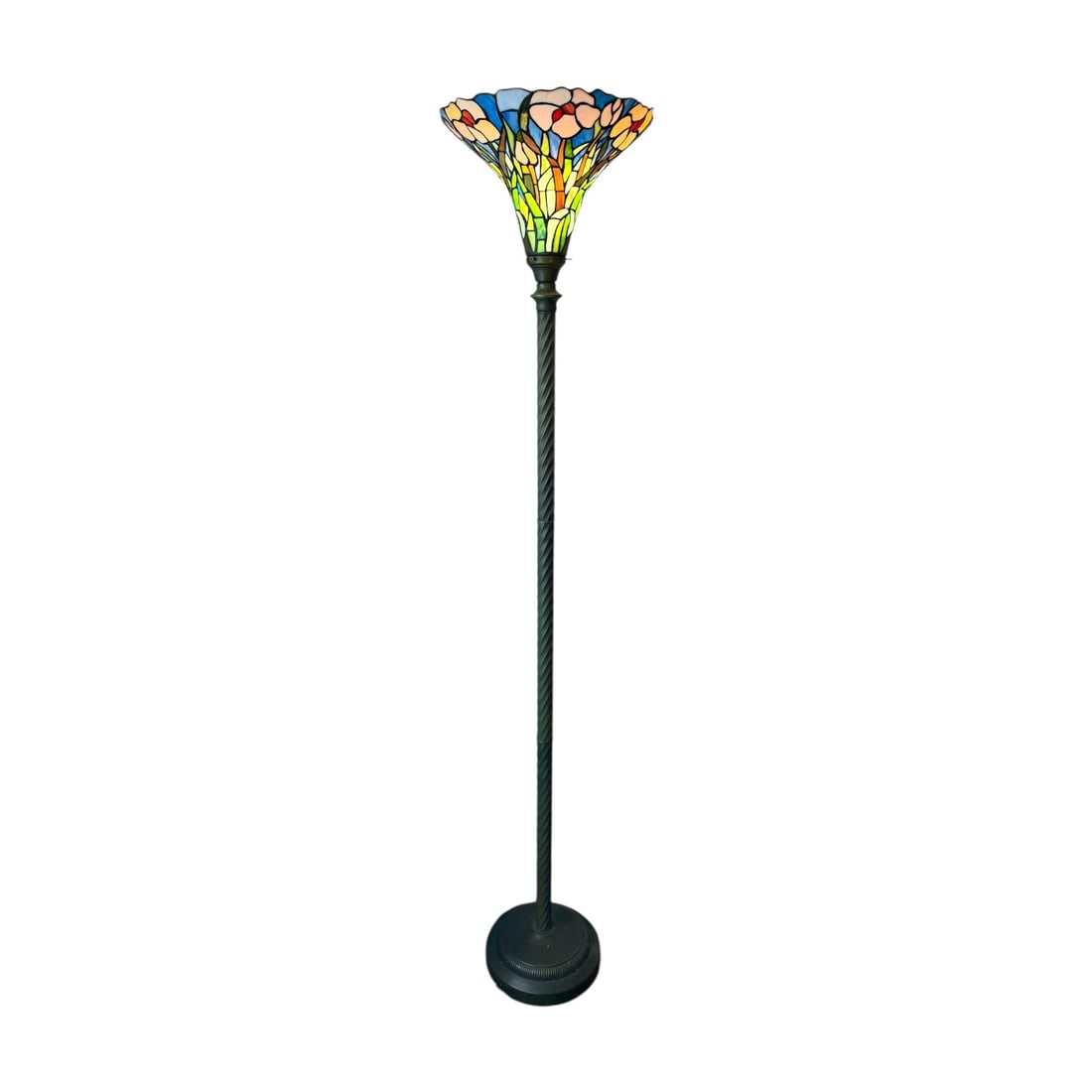 Tiffany-Style Floral Stained Glass Torchiere Floor Lamp: Decorative Tiffany-style stained glass floor lamp featuring a flared torchiere shade composed of hand-cut stained glass pieces forming a floral motif with white blossoms, green stems, and blue