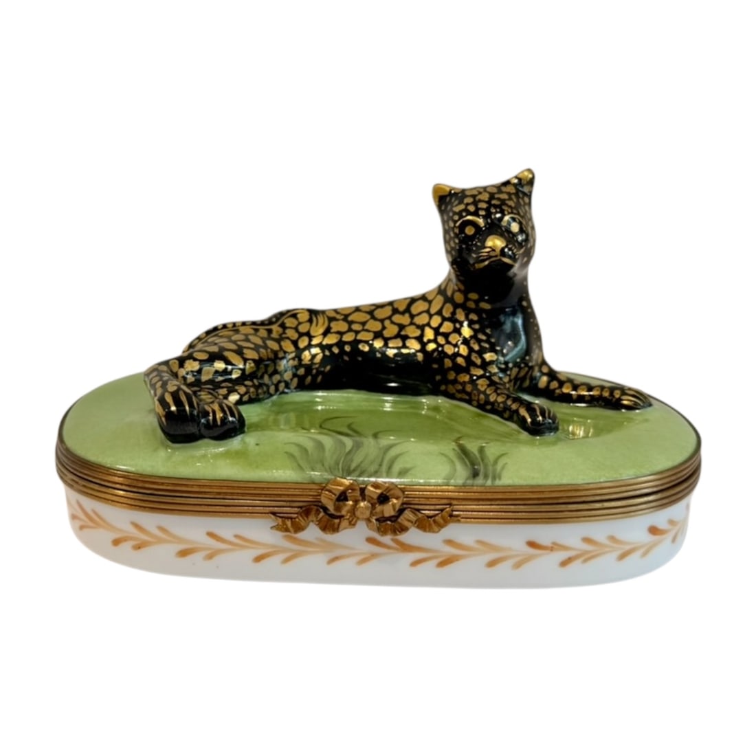 Chamart Limoges France Hand-Painted Leopard Porcelain Trinket Box: A decorative French Limoges porcelain trinket box featuring a reclining black leopard or panther embellished with hand-painted gilt spots. The sculptural animal forms the lid and rests upon a green la
