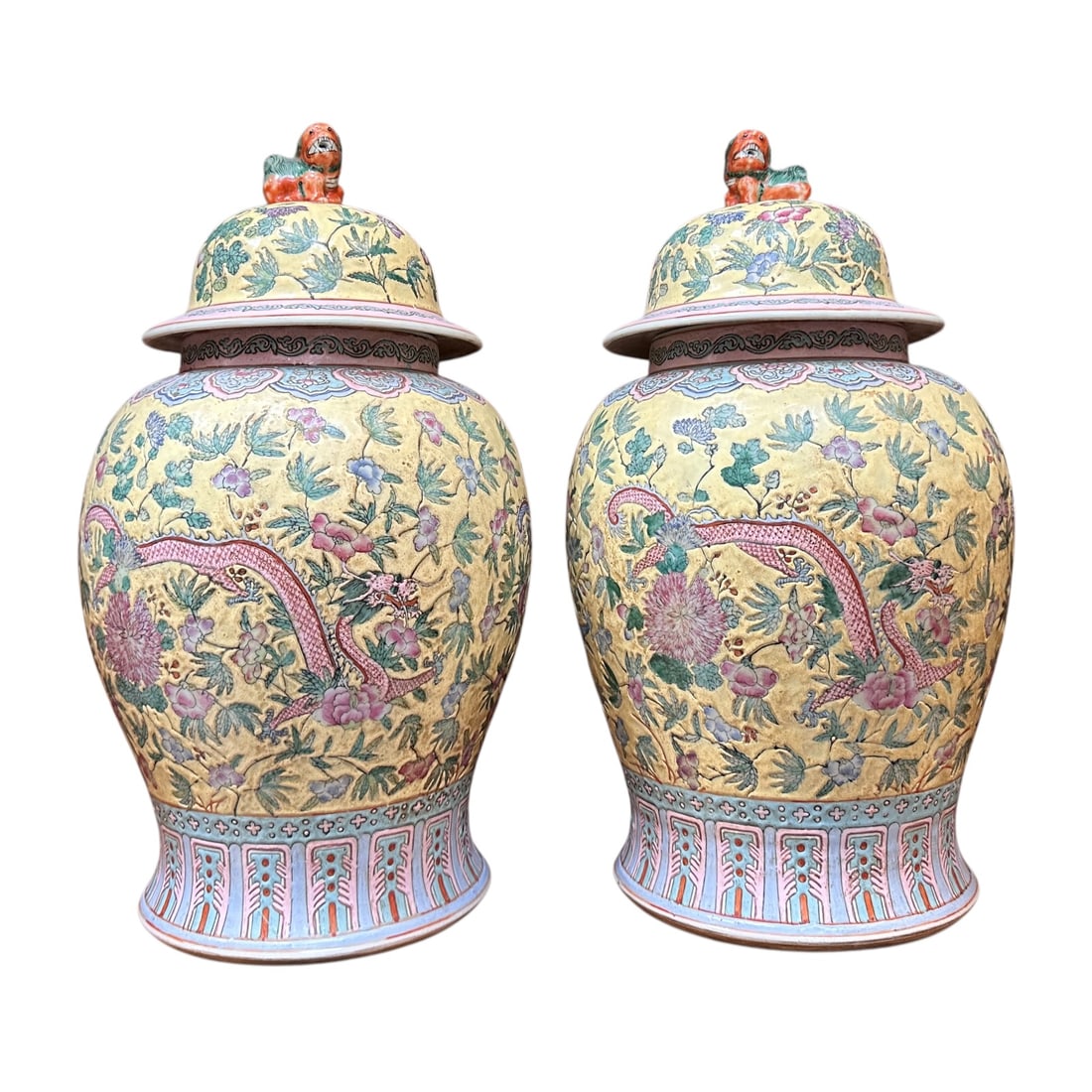 Pair Large Chinese Famille Rose Yellow Ground Ginger Jars Foo Dog Covered Vases: A magnificent, large matching pair of Chinese porcelain temple jars (covered ginger jars) decorated in the vibrant Famille Rose (Fencai) enamel palette.Dating to the mid-to-late 20th century, these su