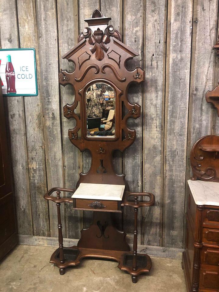 Walnut Antique Victorian hall tree: Walnut Antique Victorian hall tree with marble top drawer and umbrella stands.