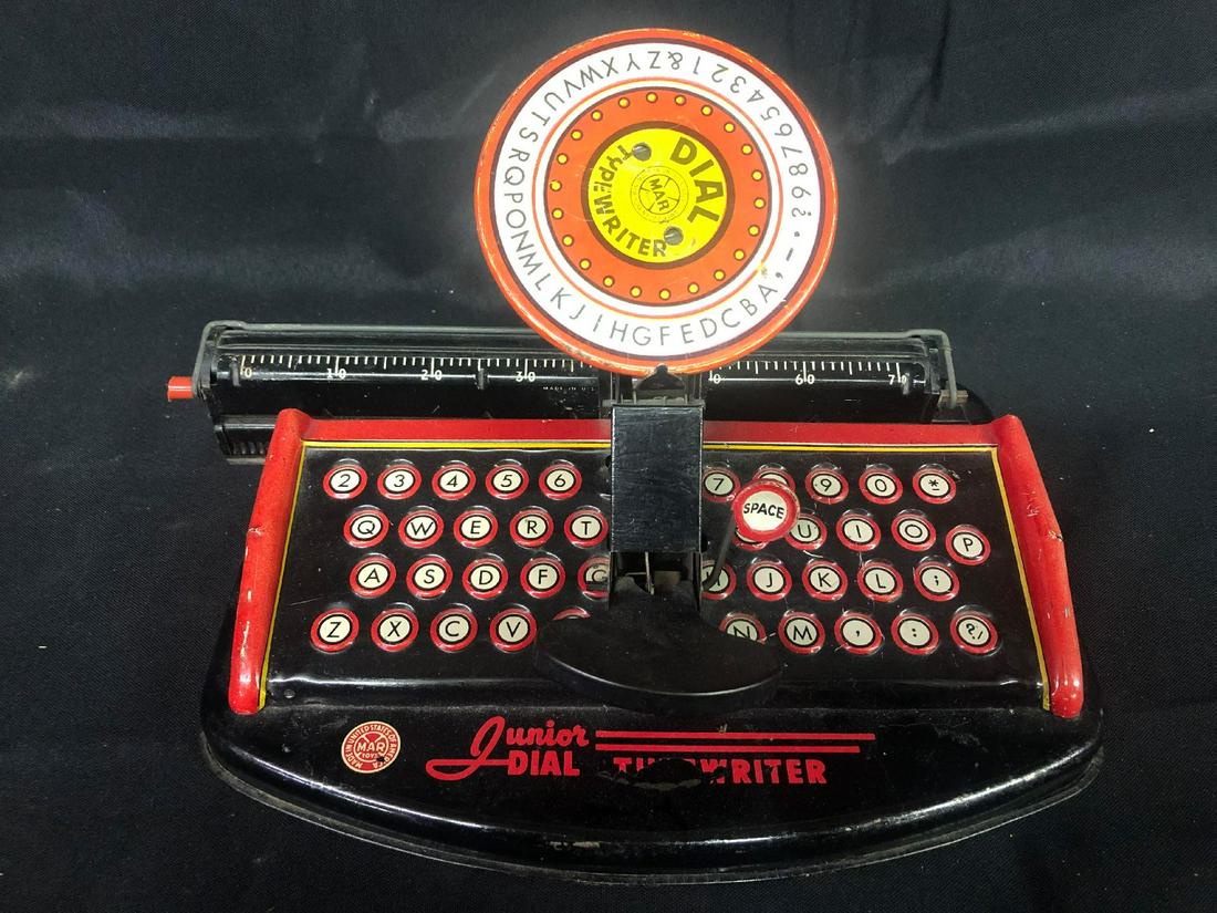 Marx Co. Junior Dial Typewriter Tin Toy: Marx Co. Junior Dial Typewriter Tin Toy