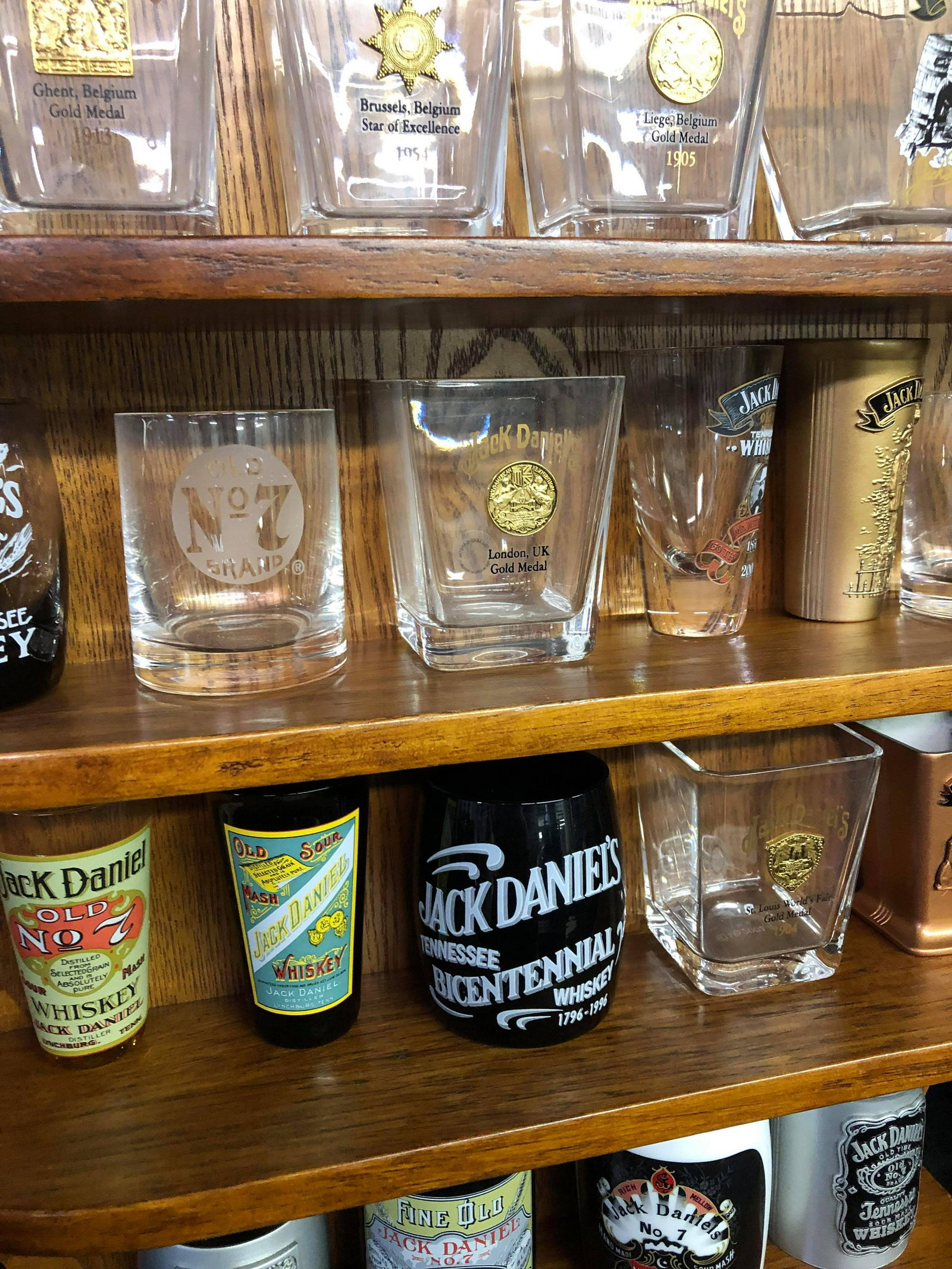 COLLECTION OF JACK DANIEL'S SHOT GLASSES & DISPLAY: COLLECTION OF JACK DANIEL'S SHOT GLASSES & DISPLAY