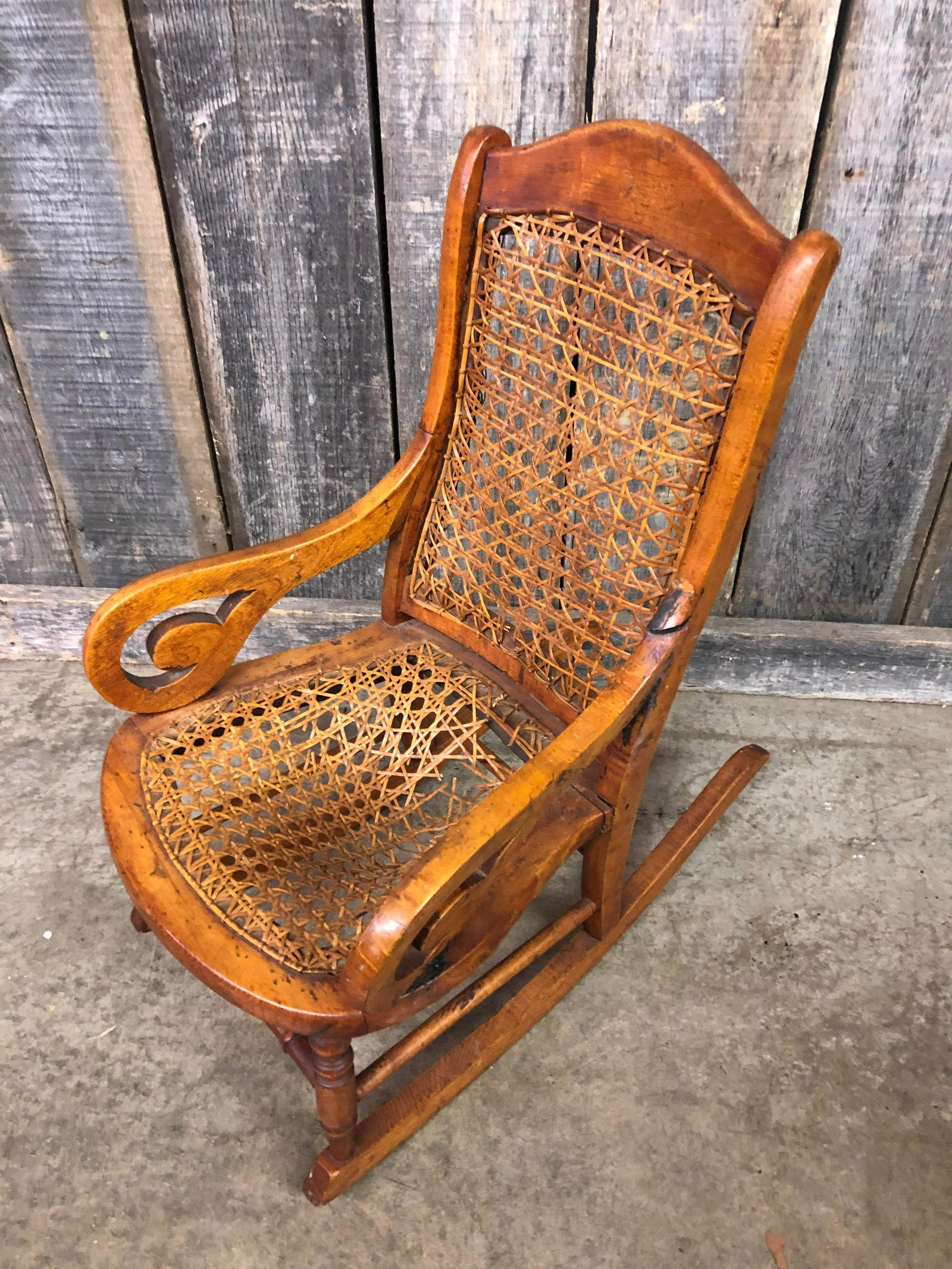 Cane Bottom Rocking Chair With Damage: Cane Bottom Rocking Chair With Damage