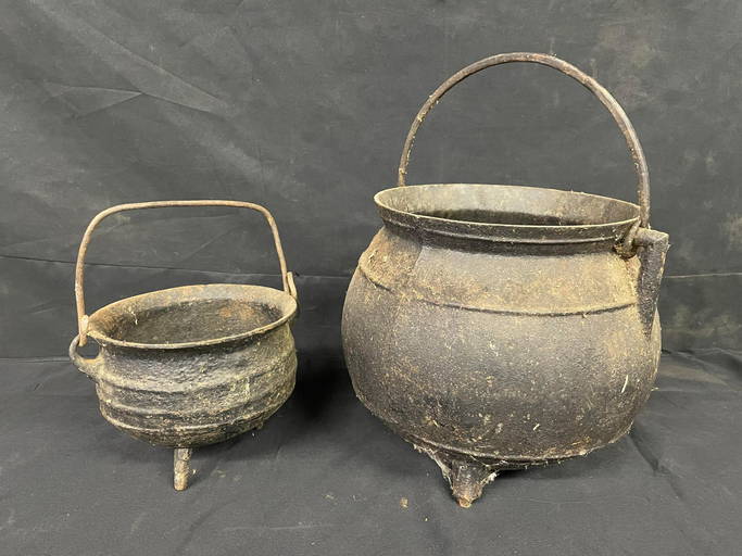 Pair Of Cast Iron Kettles (0266) on Jun 11, 2022 Swisher Bros. Auction LLC in KY