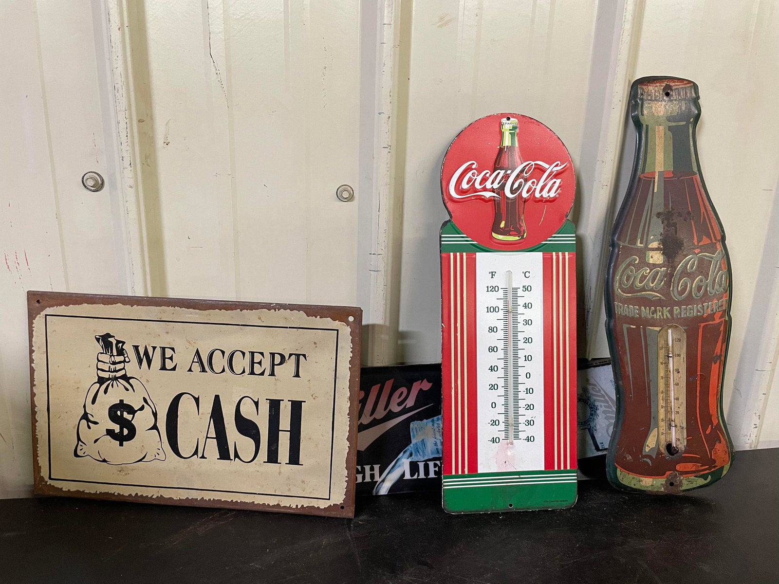 Signs: Coca-Cola, Miller, Cash: Signs: Coca-Cola, Miller, Cash