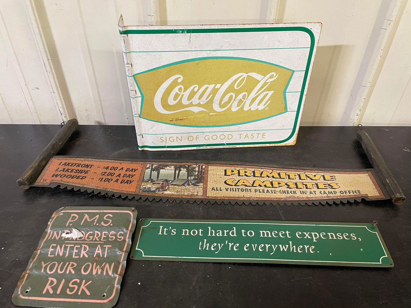 Collection of Signs: Coca-Cola Flange, Vanity Signs, Decorated Two Man Saw (1 of 1)