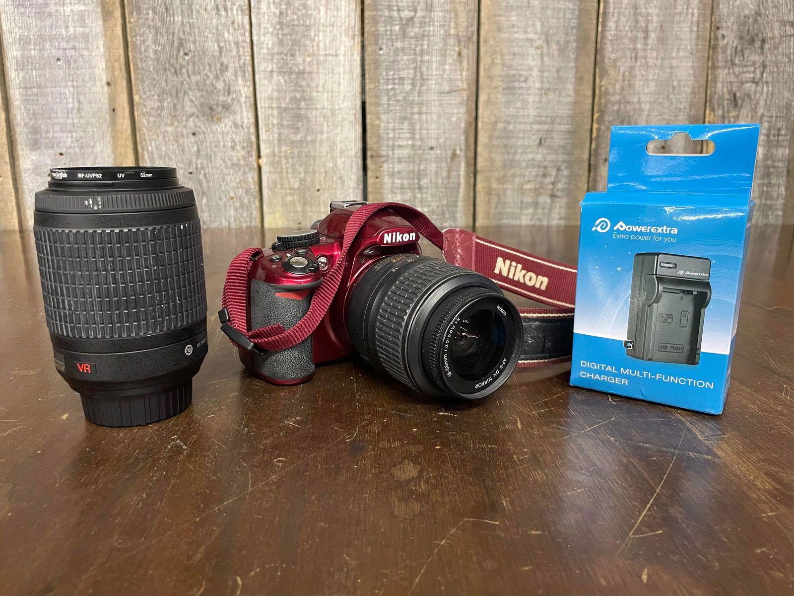 Nikon Camera with Zoom Lens and Battery Charger: Nikon Camera with Zoom Lens and Battery Charger