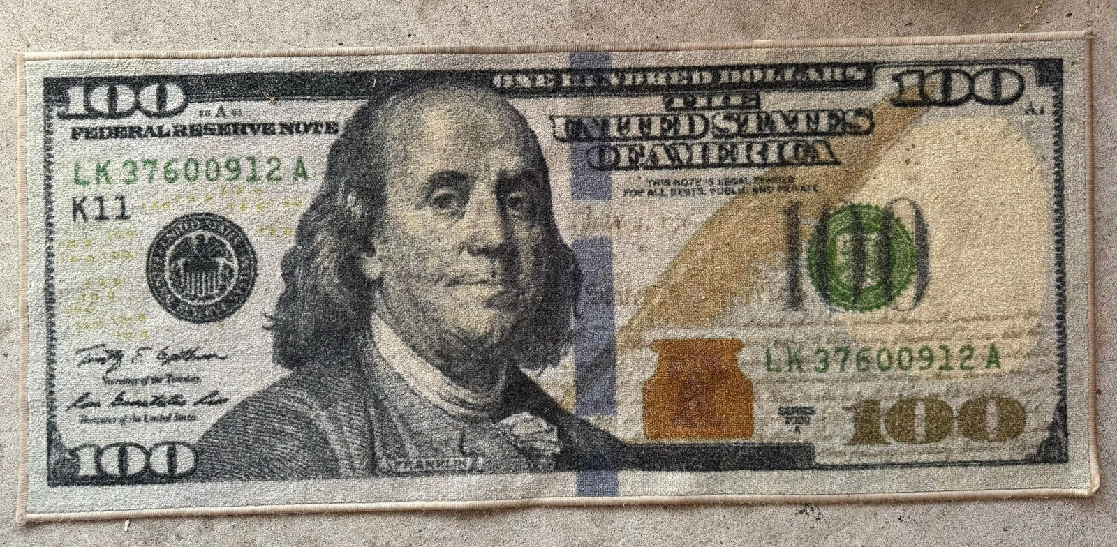 $100 Bill Embordered Rug - Approx 2' x 6'.4": $100 Bill Embordered Rug - Approx 2' x 6'.4"