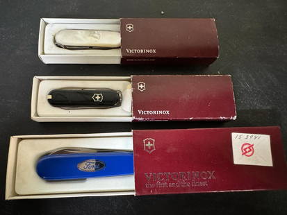 Trio of Victorinox Swiss Army Knives: Trio of Victorinox Swiss Army Knives