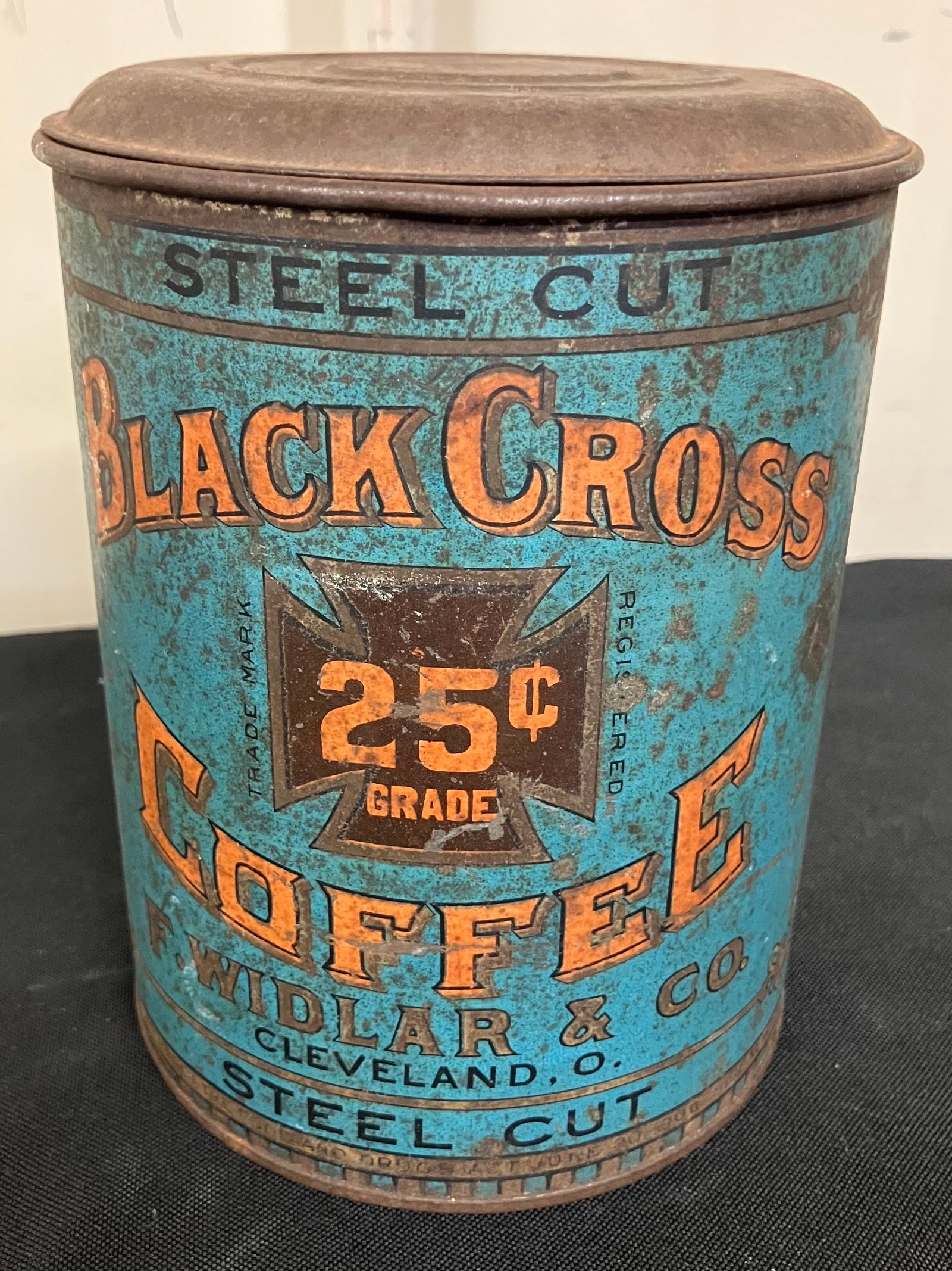 Pair Of Early Advertising Tins Including 25 Cent Black Cross Coffee Pitcher Tin (5"H) And DriPruf: Pair Of Early Advertising Tins Including 25 Cent Black Cross Coffee Pitcher Tin (5"H) And DriPruf Washer Kit With Contents (7"W)