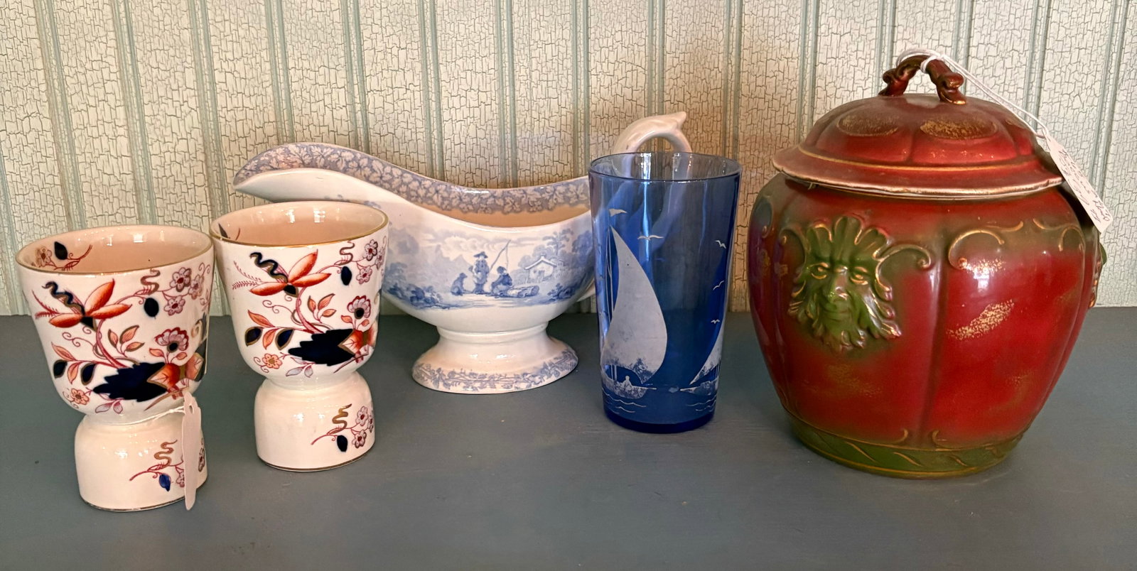 Bacchus Head Red Jar (6"), 1883-1891 Double Egg Cups, Gravy Dish And Blue Sailboat Decorated Glass: Bacchus Head Red Jar (6"), 1883-1891 Double Egg Cups, Gravy Dish And Blue Sailboat Decorated Glass