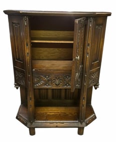 Gothic Style Oak Wine Cabinet With Carved Front And Sides Made By The Lifetime Furniture Company