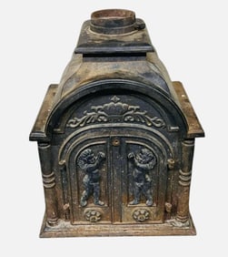 Early Cast Iron Gothic Style Parlor Stove With Ornate Doors Depicting Cherubs And A Crown