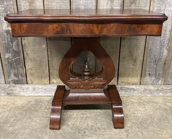 Antique American Empire Flame Mahogany Game Table featuring a Serpentine Top and Lyre-shaped Support