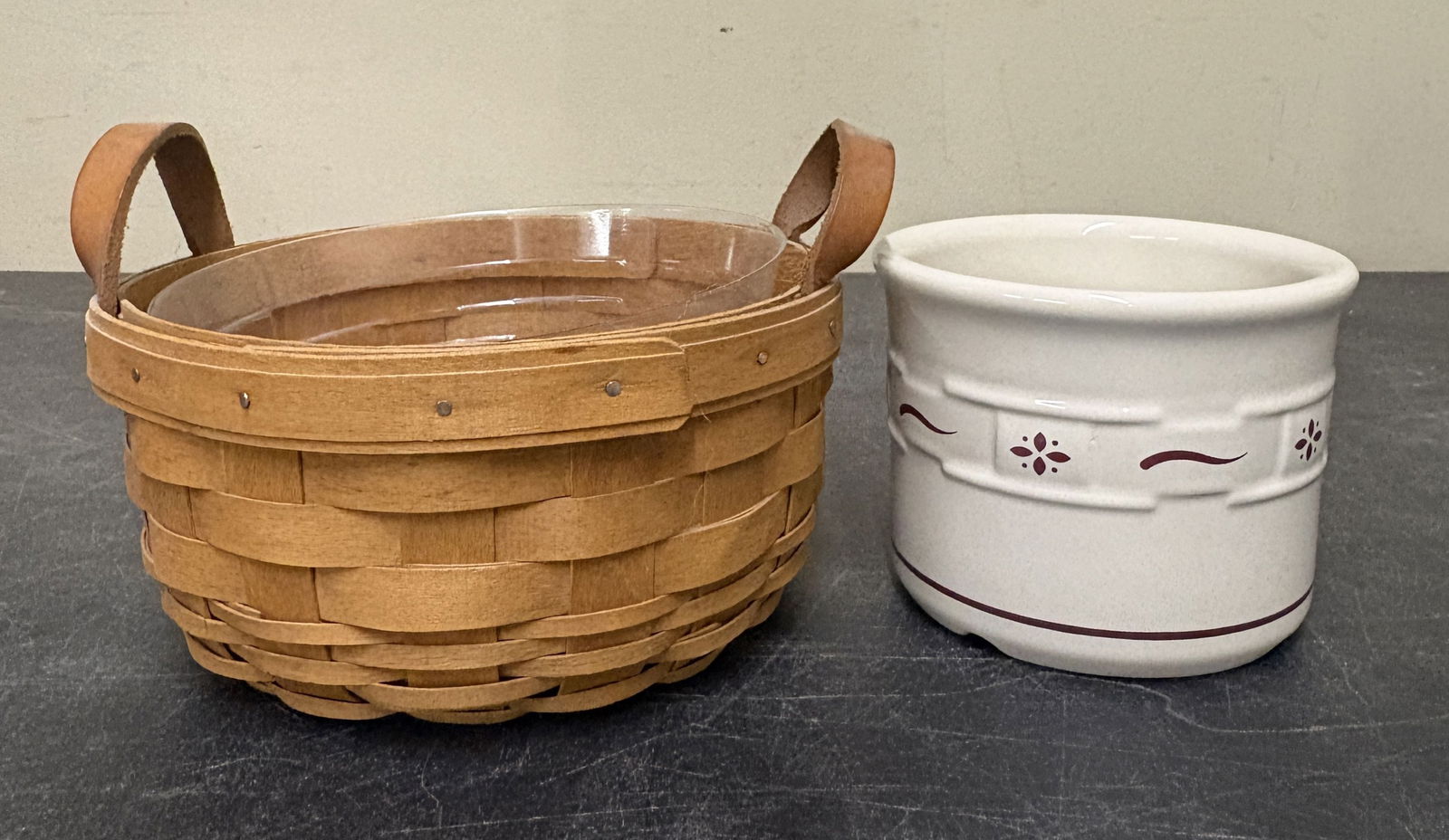 Longaberger Woven Traditions Button Basket featuring Double Leather Handle with Button Basket Brick,: Longaberger Woven Traditions Button Basket featuring Double Leather Handle with Button Basket Brick, alongside a matching piece of Longaberger Woven Traditions Pottery that Nestles Inside of the Baske