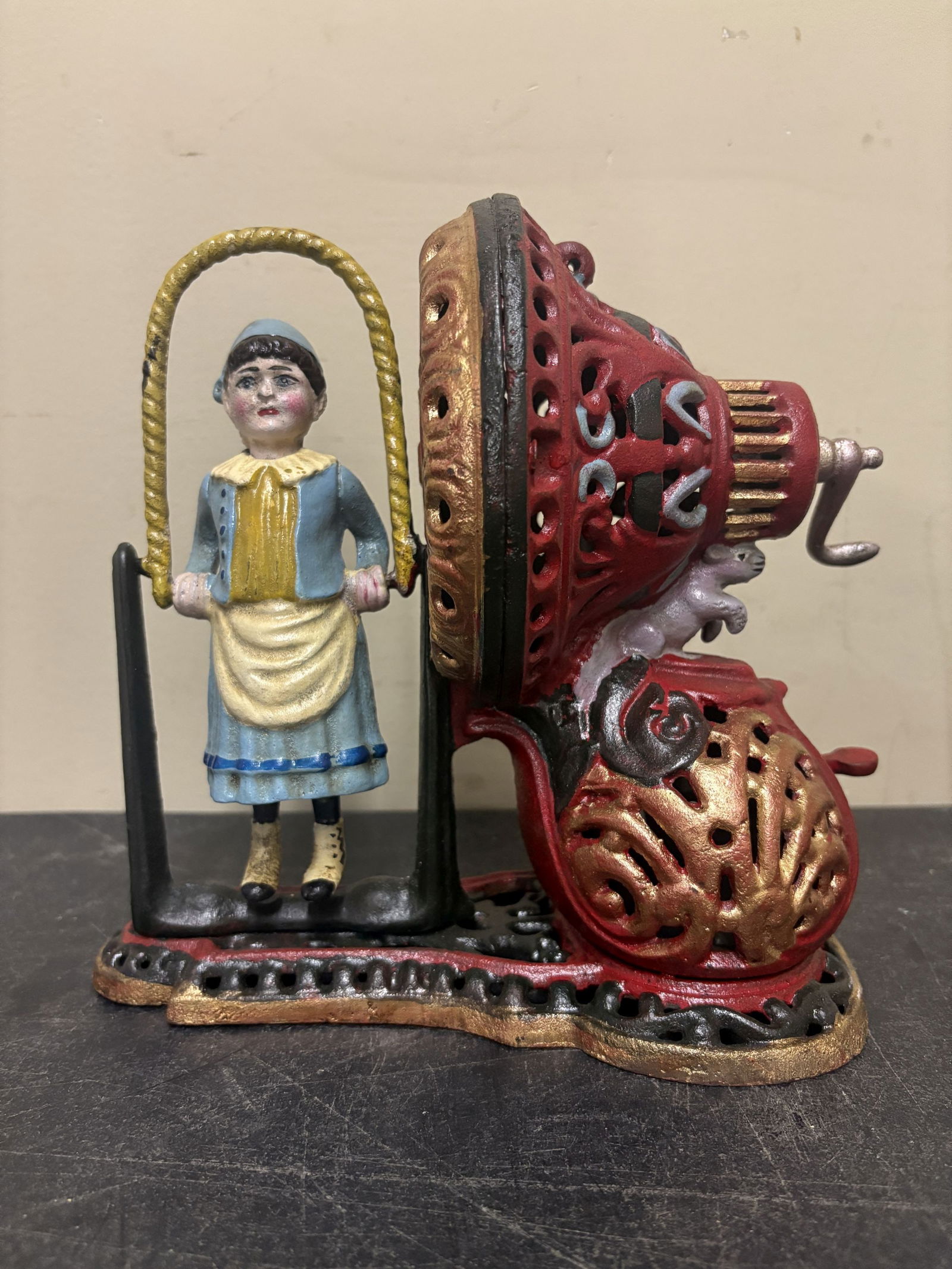 Vintage Cast Iron "Girl Skipping Rope" Mechanical Coin Bank - 8"x3"x8": Vintage Cast Iron "Girl Skipping Rope" Mechanical Coin Bank - 8"x3"x8"