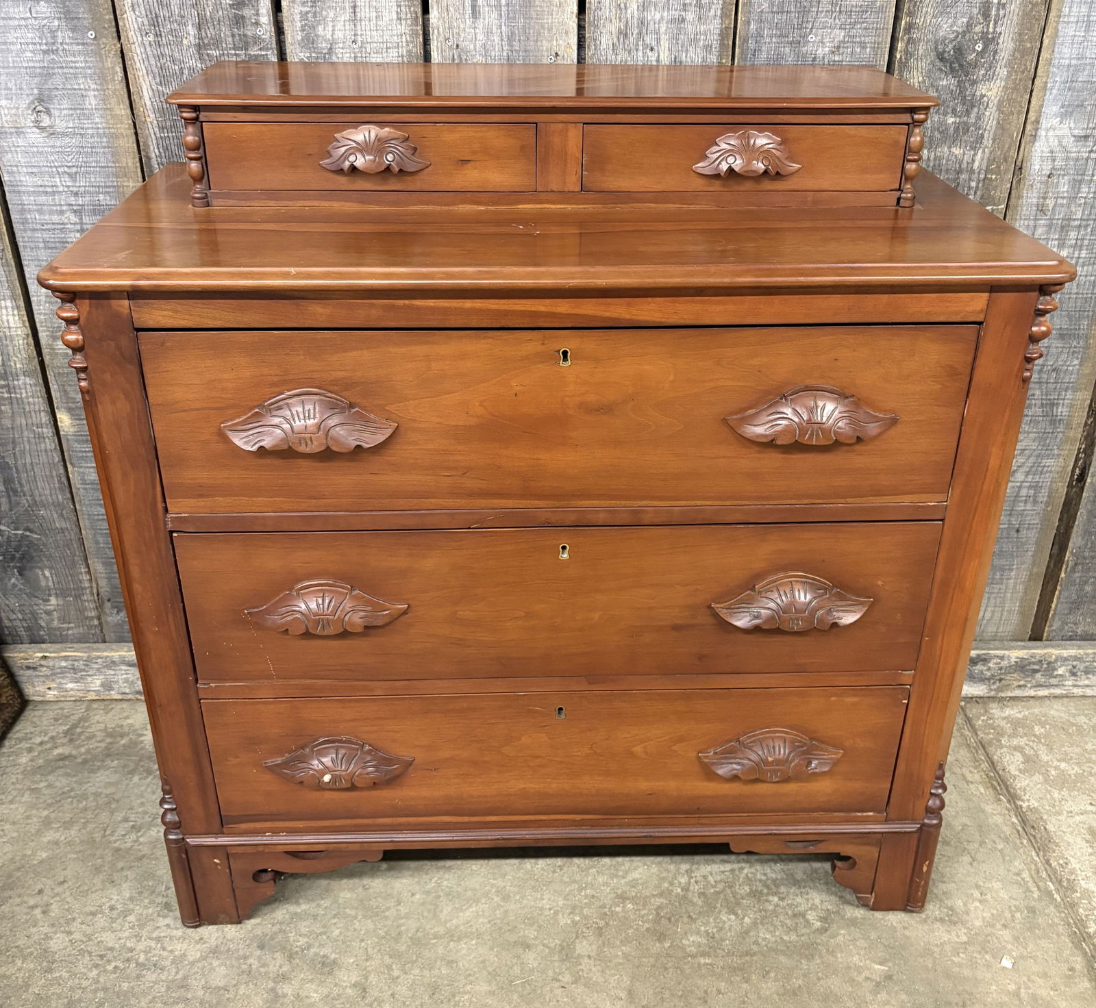 Victorian Carved Walnut Step-Back Dresser Chest with Hand-Carved Drawer Pulls, likely dating from (1 of 6)