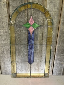 Vintage Stained Glass Window Panel featuring a Geometric Design with a Central Cross Motif in Pink,