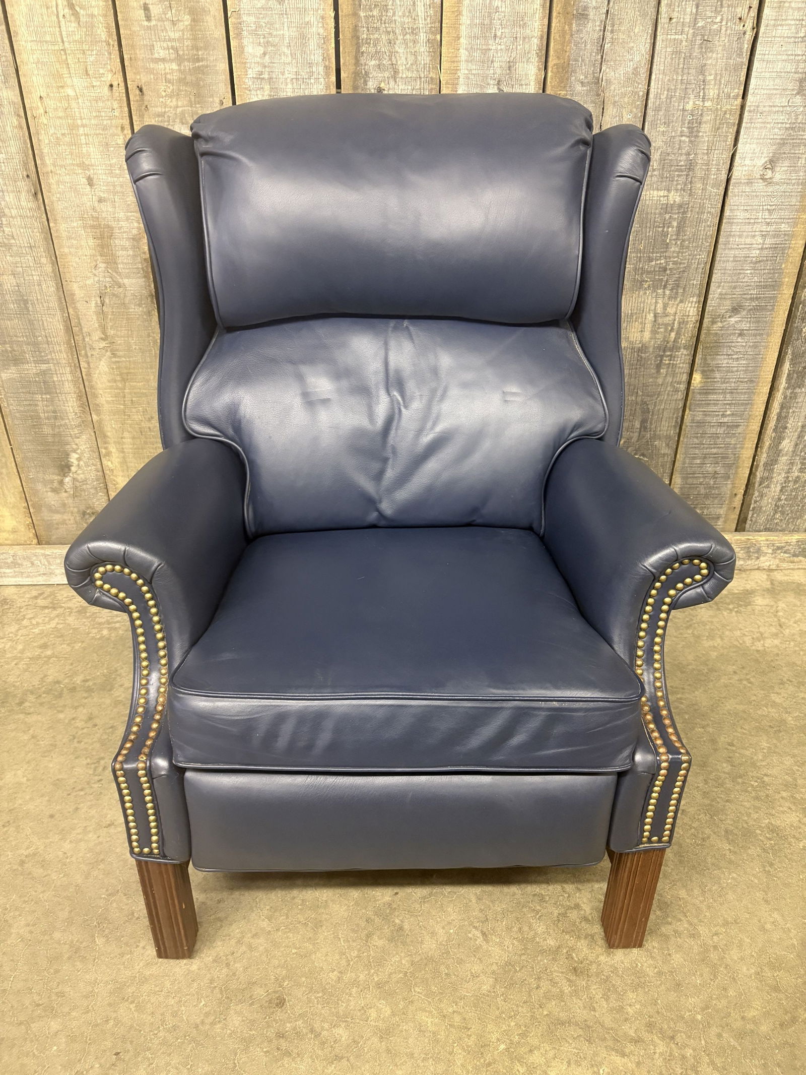 Berkline Chippendale Reclining Wing Chair In Navy - Blue Leather 34"X38"X45": Berkline Chippendale Reclining Wing Chair In Navy - Blue Leather 34"X38"X45"