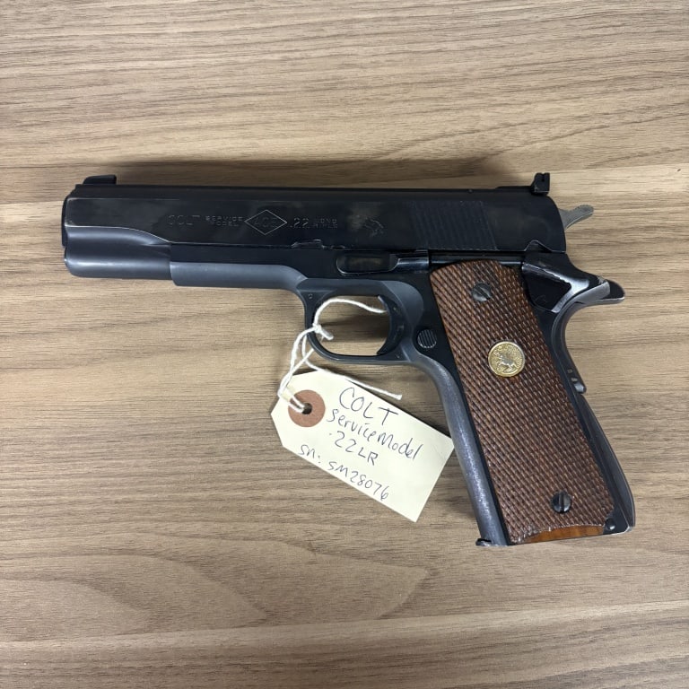 Colt Service Model .22LR Serial:SM28076 With Black Leather Holster 8.5": Colt Service Model .22LR Serial:SM28076 With Black Leather Holster 8.5"