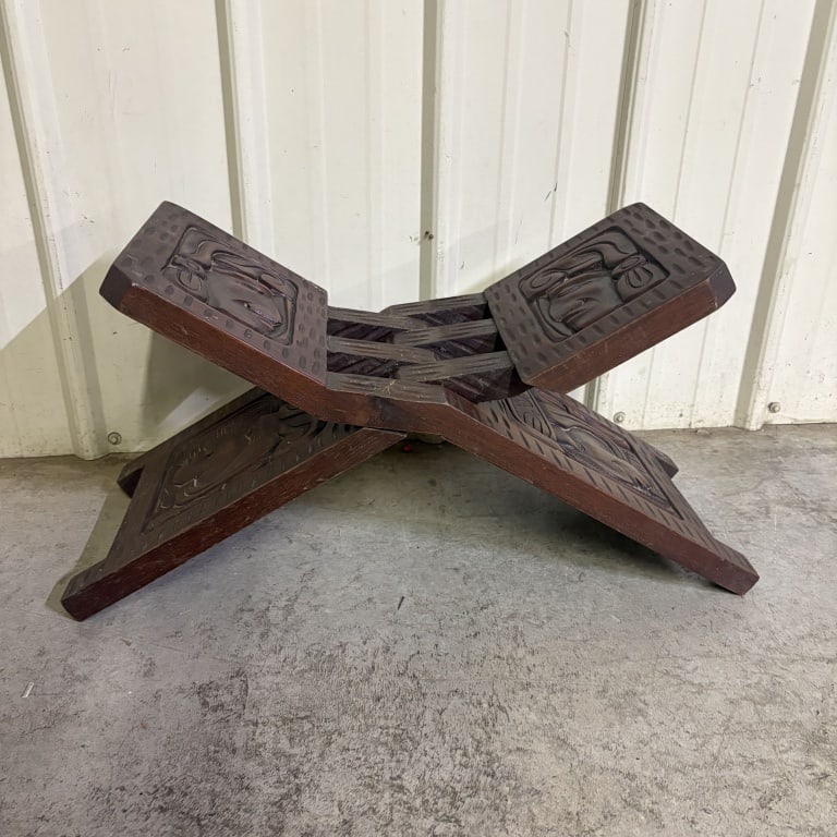 Carved Wooden Folding Chair is a Traditional African Palaver Chair, or Birthing Chair, featuring: Carved Wooden Folding Chair is a Traditional African Palaver Chair, or Birthing Chair, featuring Intricate Animal Carvings - 10"X27"