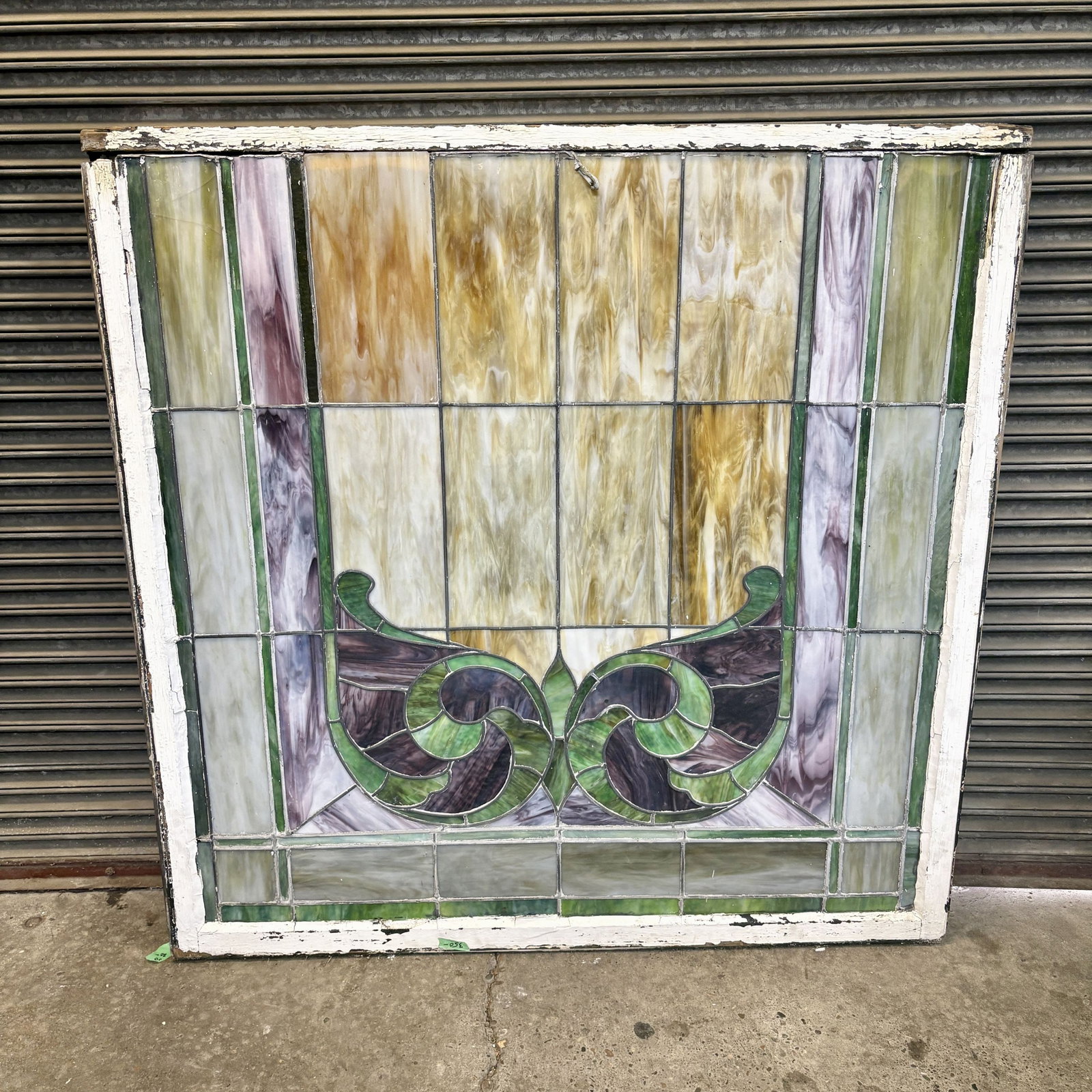 Antique Stained Glass Window, Featuring Amber Toned Textured Glass Panels With Green And Purple: Antique Stained Glass Window, Featuring Amber Toned Textured Glass Panels With Green And Purple Swirling Motif 52"X52"