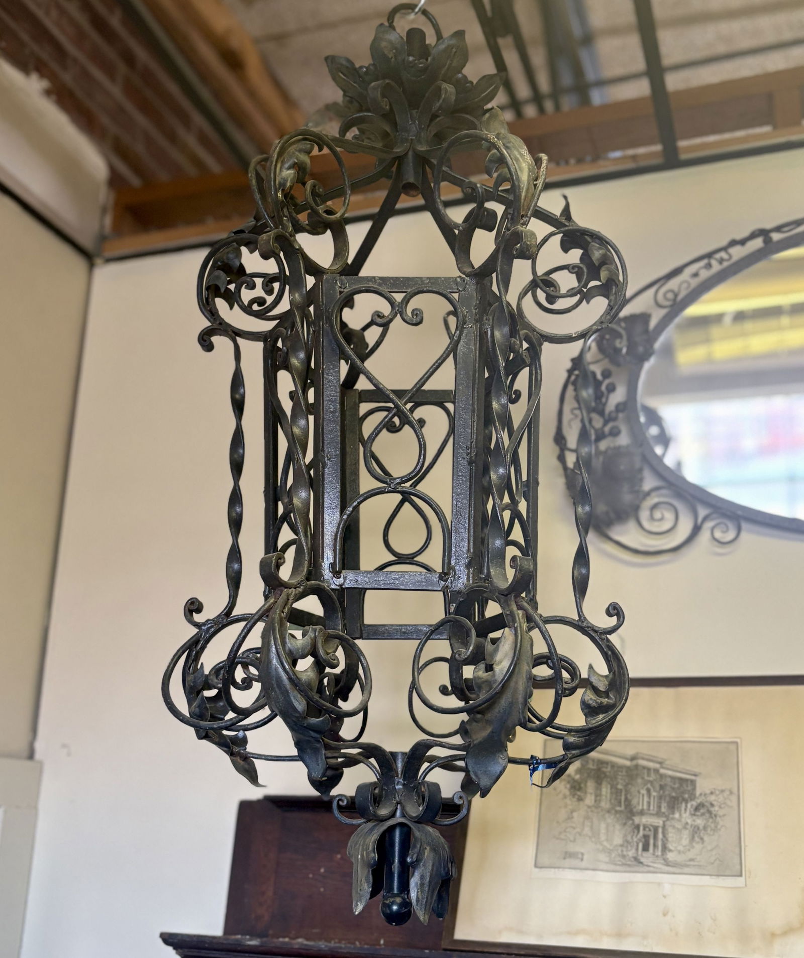 Antique Spanish Revival Style Wrought Iron Pendant Lanterns featuring Ornate Scrolls and Leaf (1 of 4)