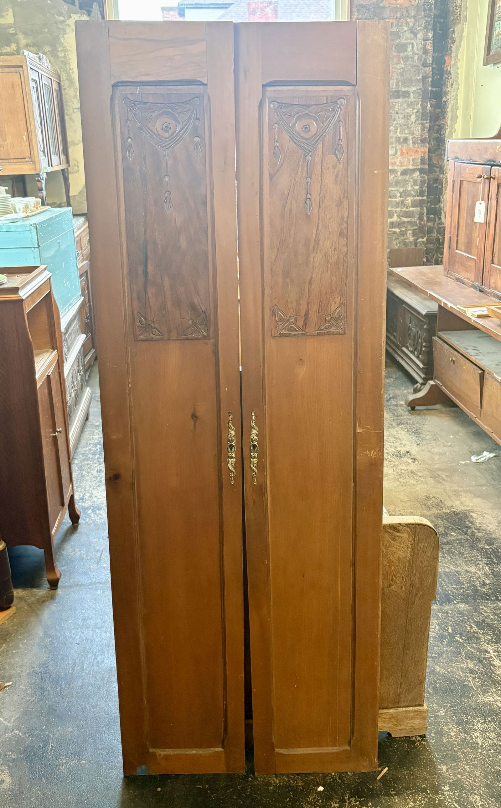 19th Century Doors with Central Motif with Hanging Tassel like Elements - 12"x66" - NOT: 19th Century Doors with Central Motif with Hanging Tassel like Elements - 12"x66" - NOT AVAILABLE FOR SHIPPING, PICK UP OR TRANSPORT ONLY